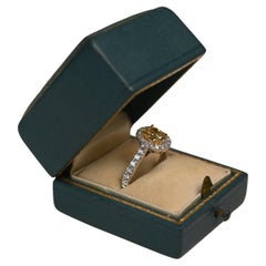 Oval Yellow Diamond (Approx. 1.10-Carats) Prong-Set Halo Ring, 18k White Gold