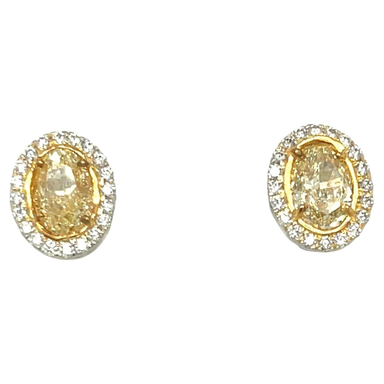 Oval Yellow Diamond Earrings 3.13 Carats GIA Certified Platinum / 18 KYG For Sale