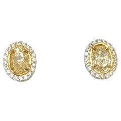 Oval Yellow Diamond Earrings 3.13 Carats GIA Certified Platinum / 18 KYG
