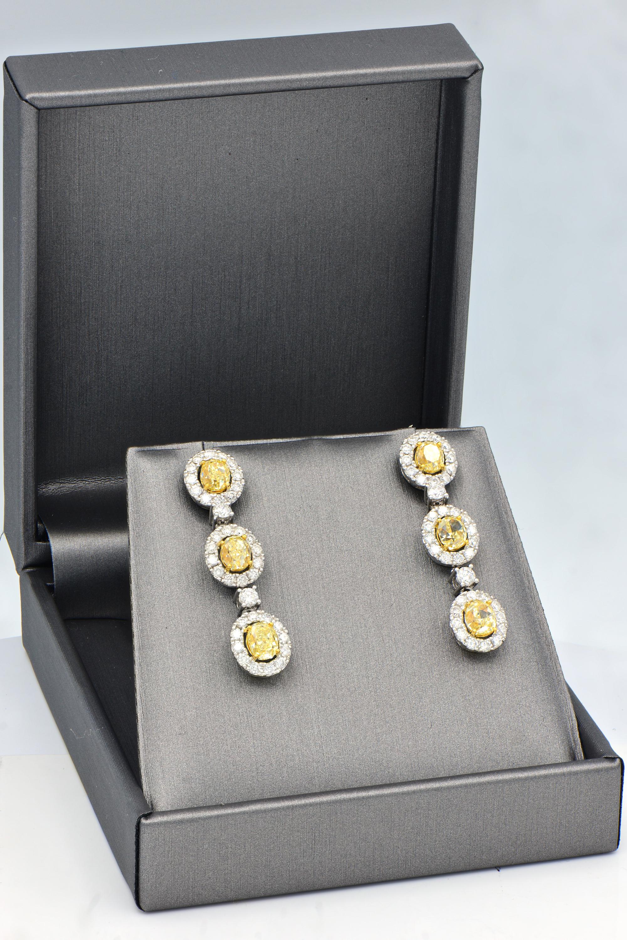 oval diamond earrings with halo