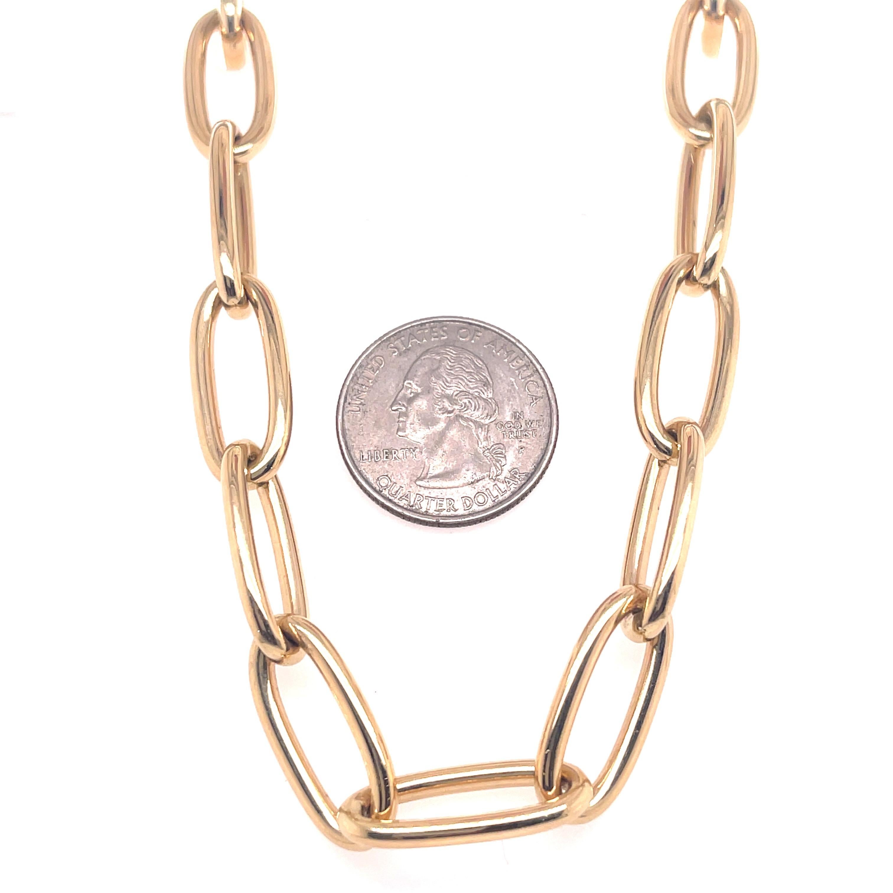 Oval shape link necklace weighing 25.2 grams in 14 karat yellow gold. Made in Italy. 