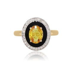 Oval Yellow Sapphire and Diamond Ring