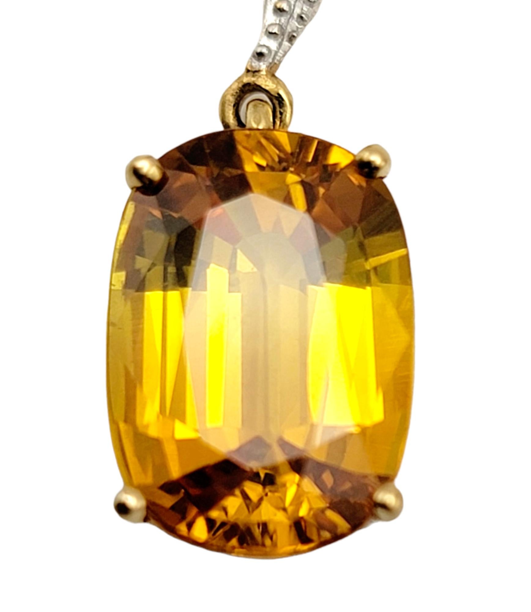 Contemporary Oval Yellow Sapphire Dangle Pendant with Diamond Swirl Bail 18 Karat Yellow Gold For Sale