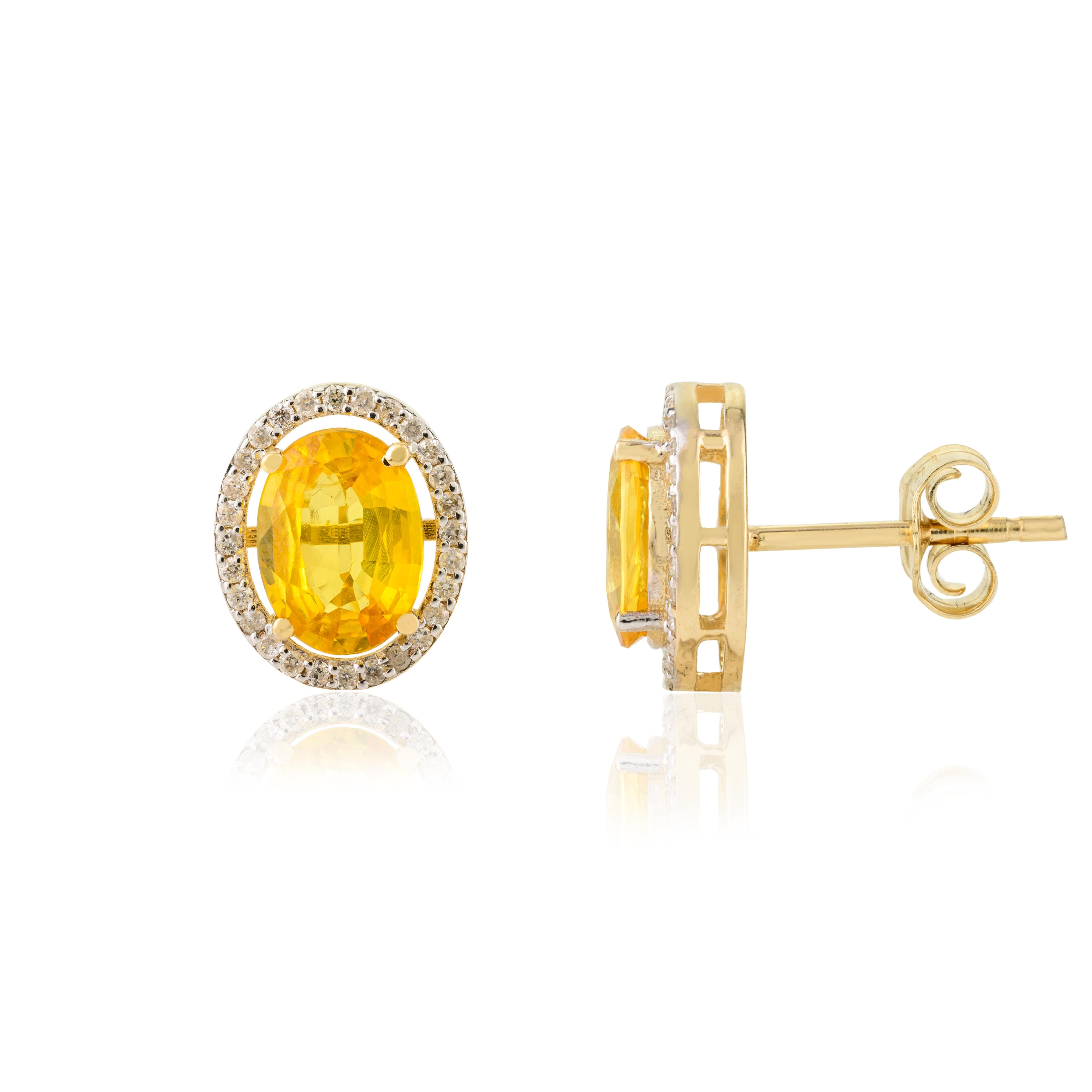 Modern Oval Yellow Sapphire Diamond Halo Everyday Studs in 14k Yellow Gold for Her For Sale