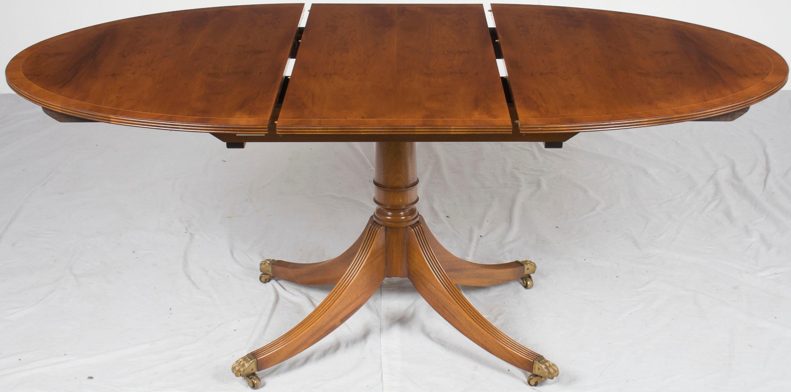 Oval Yew Wood Pedestal Dining Room Table with Leaf 1
