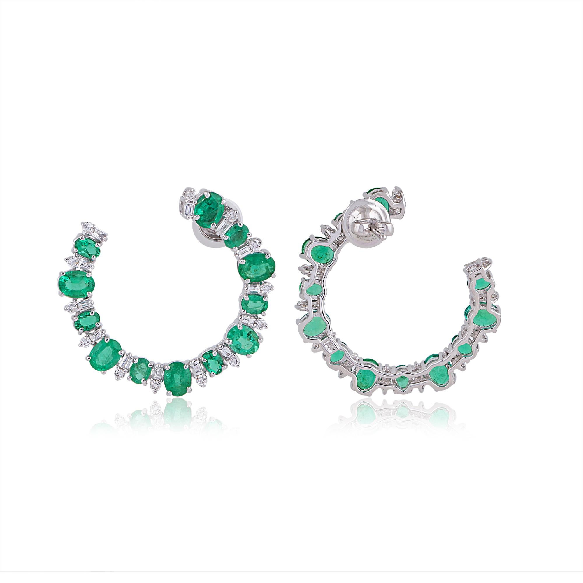 Item Code :- CN-40386
Gross Wt. :- 8.98 gm
18k White Gold Wt. :- 7.73 gm
Diamond Wt. :- 1.05 Ct. ( AVERAGE DIAMOND CLARITY SI1-SI2 & COLOR H-I )
Emerald Wt. :- 5.20 Ct. 
Earrings Size :- 28 mm approx.

✦ Sizing
.....................
We can adjust