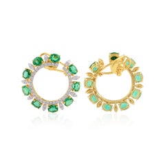 Boucles d
oreilles à levier en or jaune 18 carats avec émeraudes de Zambie ovales et diamants