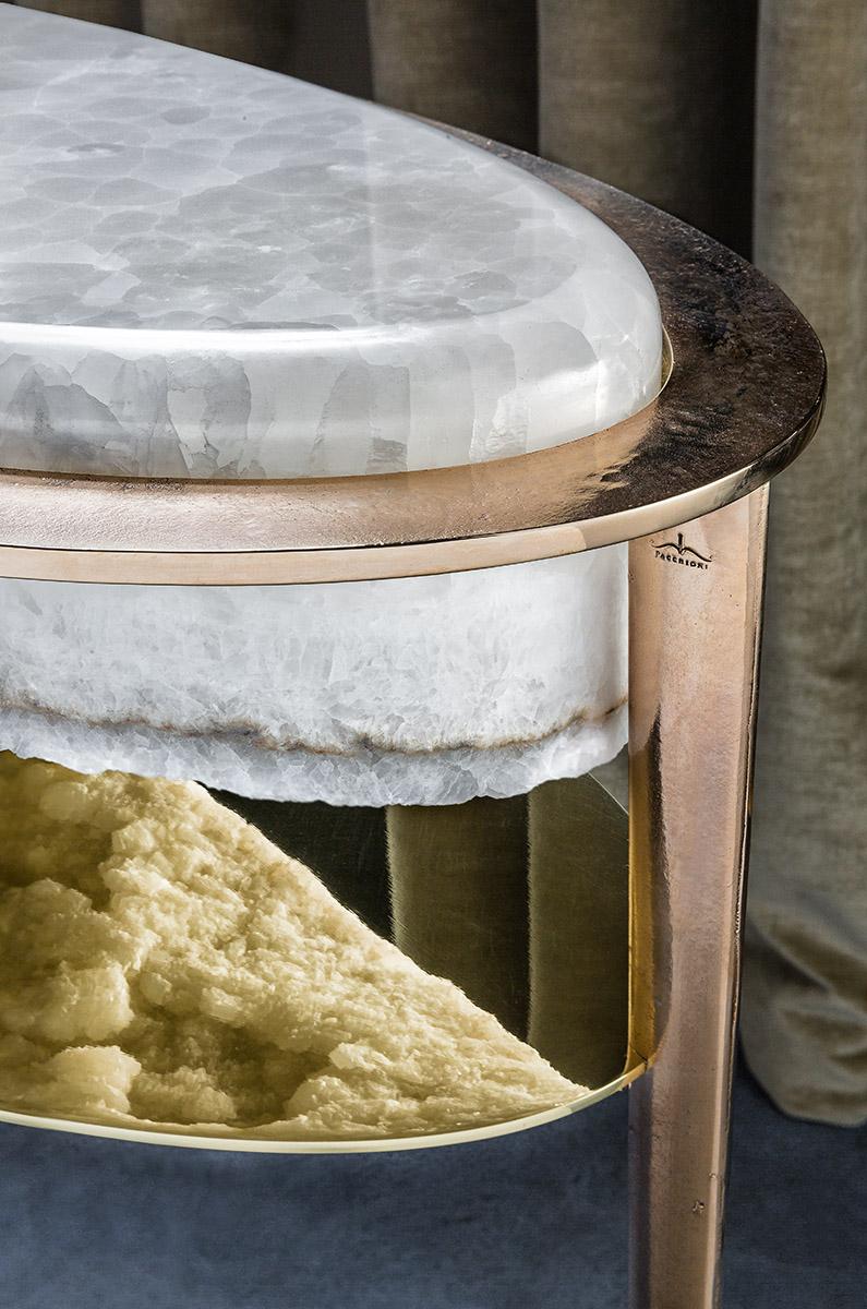 Oval Cremino is a sculptural side table, of white onyx, cast bronze and polished brass, design by Gianluca Pacchioni, Italian artist represented by Galerie Negropontes in Paris, France.

Milanese artist Gianluca Pacchioni developed a passion for