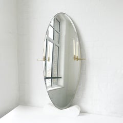 Ovalis Oval Bevelled Mirror with Decorative Candleholers and Brushed Brass Frame