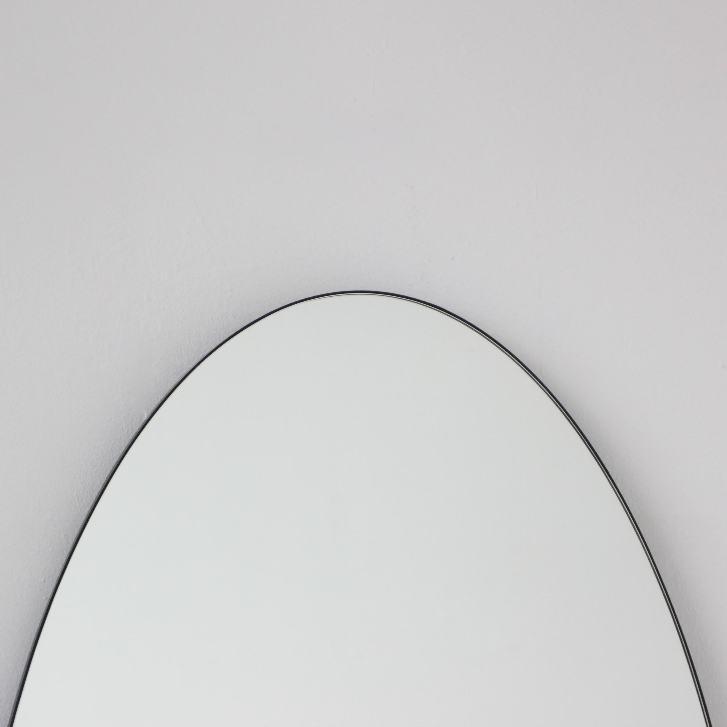 Powder-Coated Ovalis Oval Contemporary Wall Mirror with Black Frame, XL For Sale