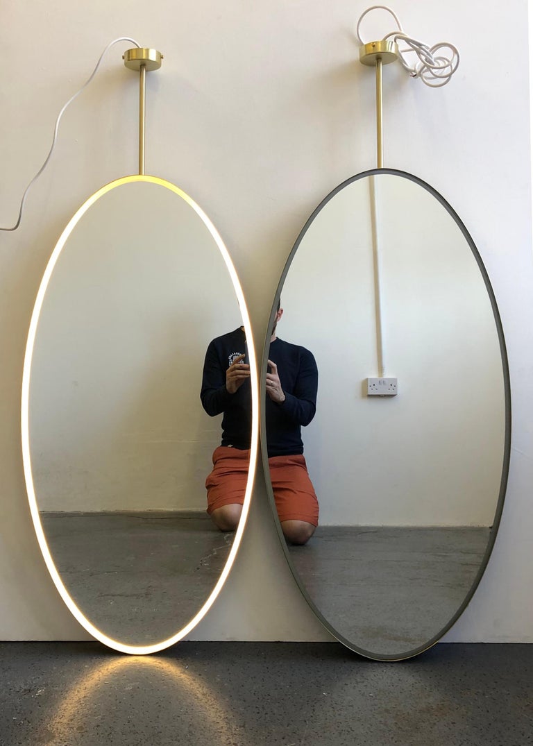 Ovalis Suspended Mirror with a Brass Frame and Front Illumination, Customisable In New Condition For Sale In London, GB
