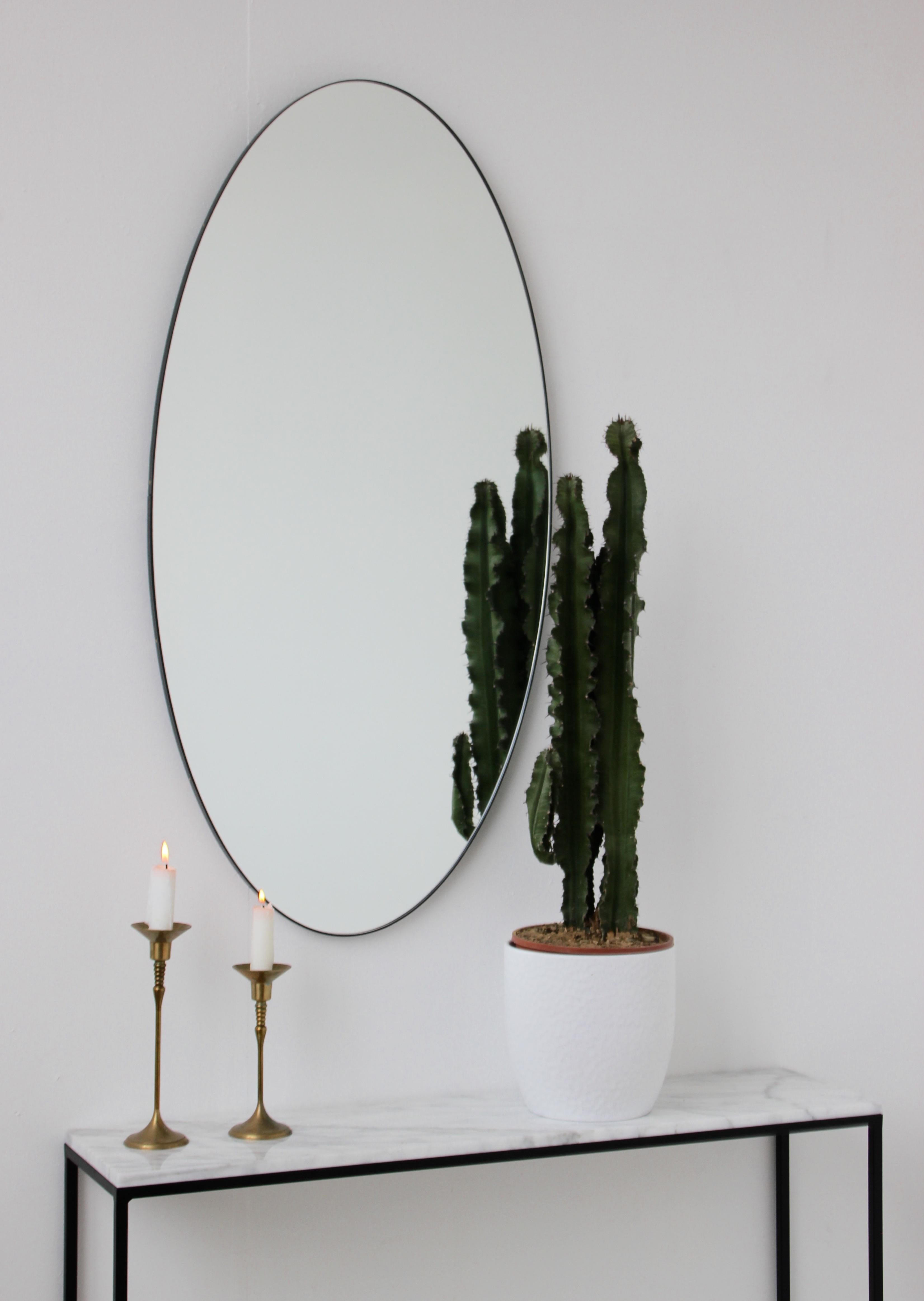 British Ovalis Oval Modern Handcrafted Mirror with Black Frame, Medium For Sale