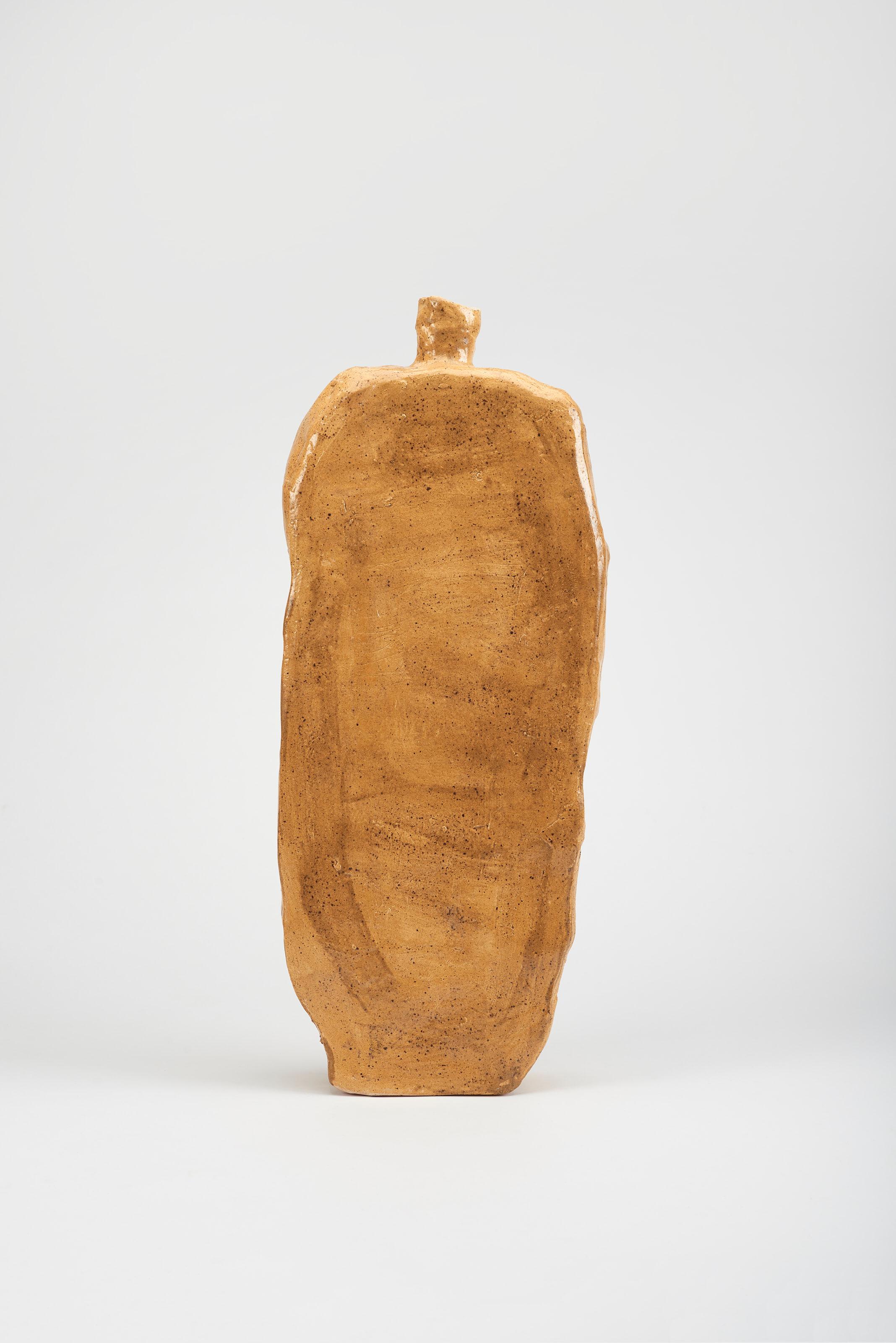 Ovas Large Vase by Willem Van Hooff
Dimensions: W 38 x D 10 x H 65 cm (Dimensions may vary as pieces are hand-made and might present slight variations in sizes)
Material: Glazed Ceramics.

Core is a serie of vessels. Inspired by prehistoric african