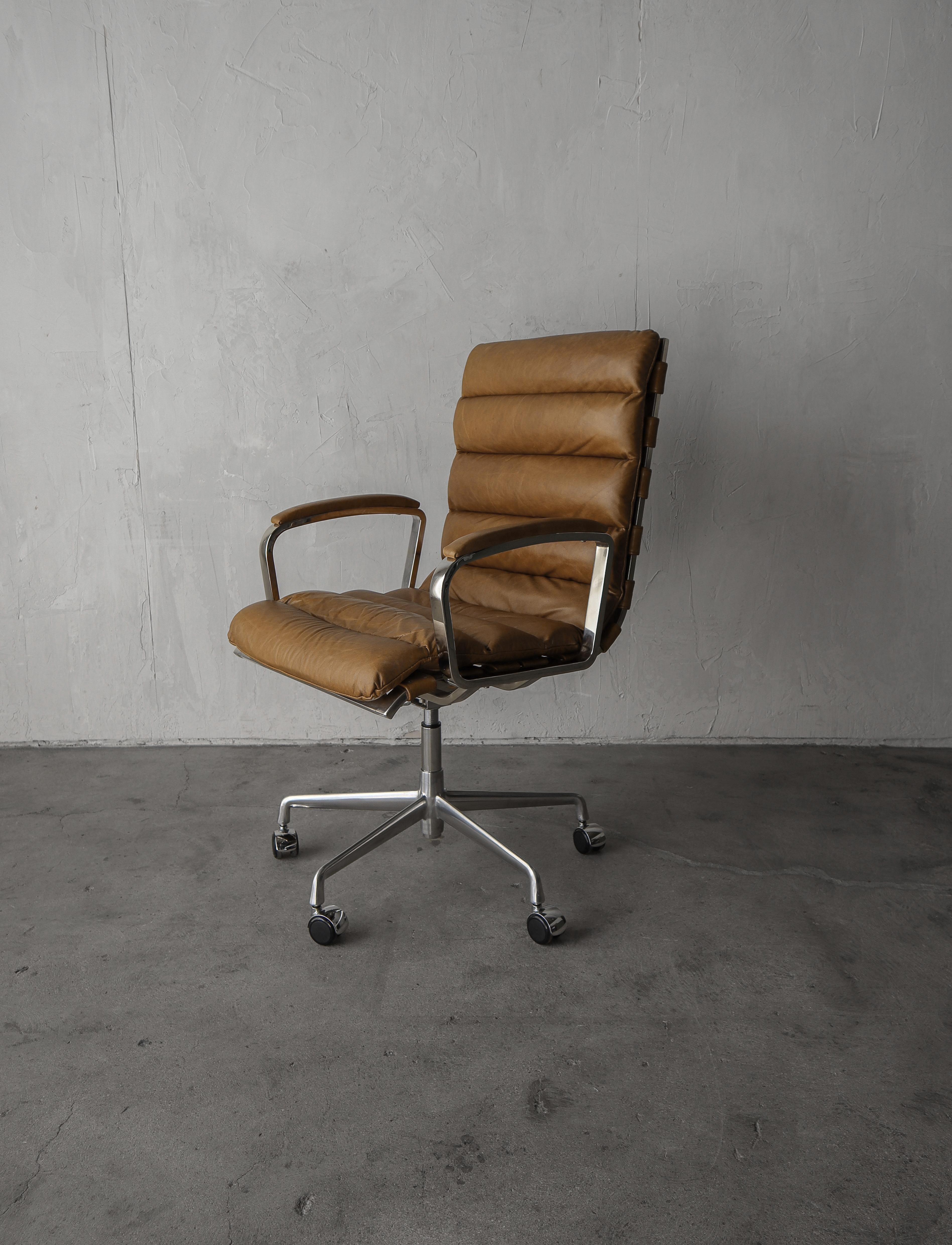 Classic Oviedo Desk Chair by Restoration Hardware (2 STILL AVAILABLE)

These gorgeous chairs pull their design from mid century classics.  The gorgeous channeled, perfectly patinated Berkshire leather seat and straps, bright chrome, fully height