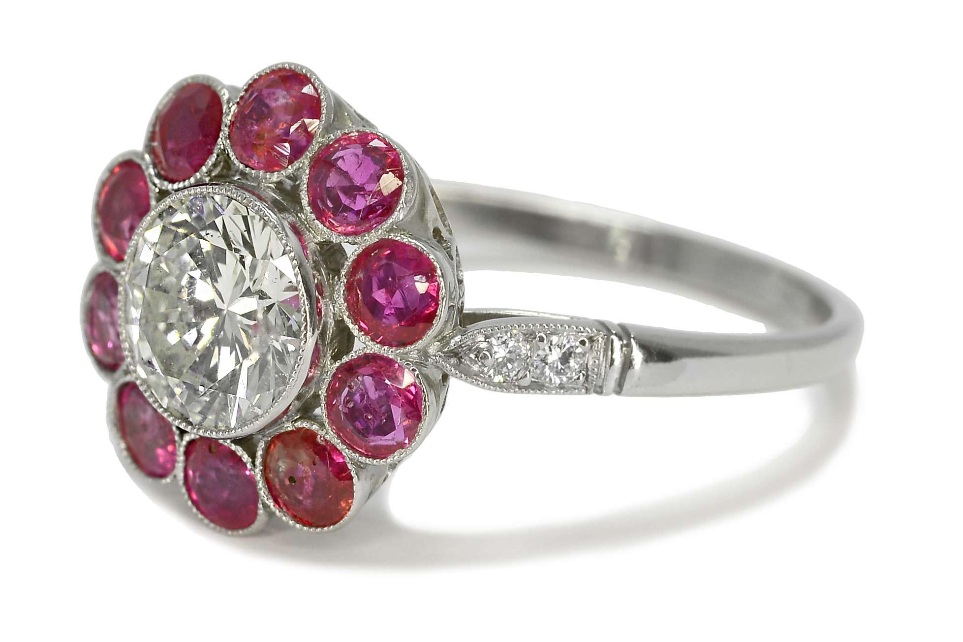 Brilliant Cut Contemporary Diamond and Ruby Halo Flower Engagement Ring For Sale