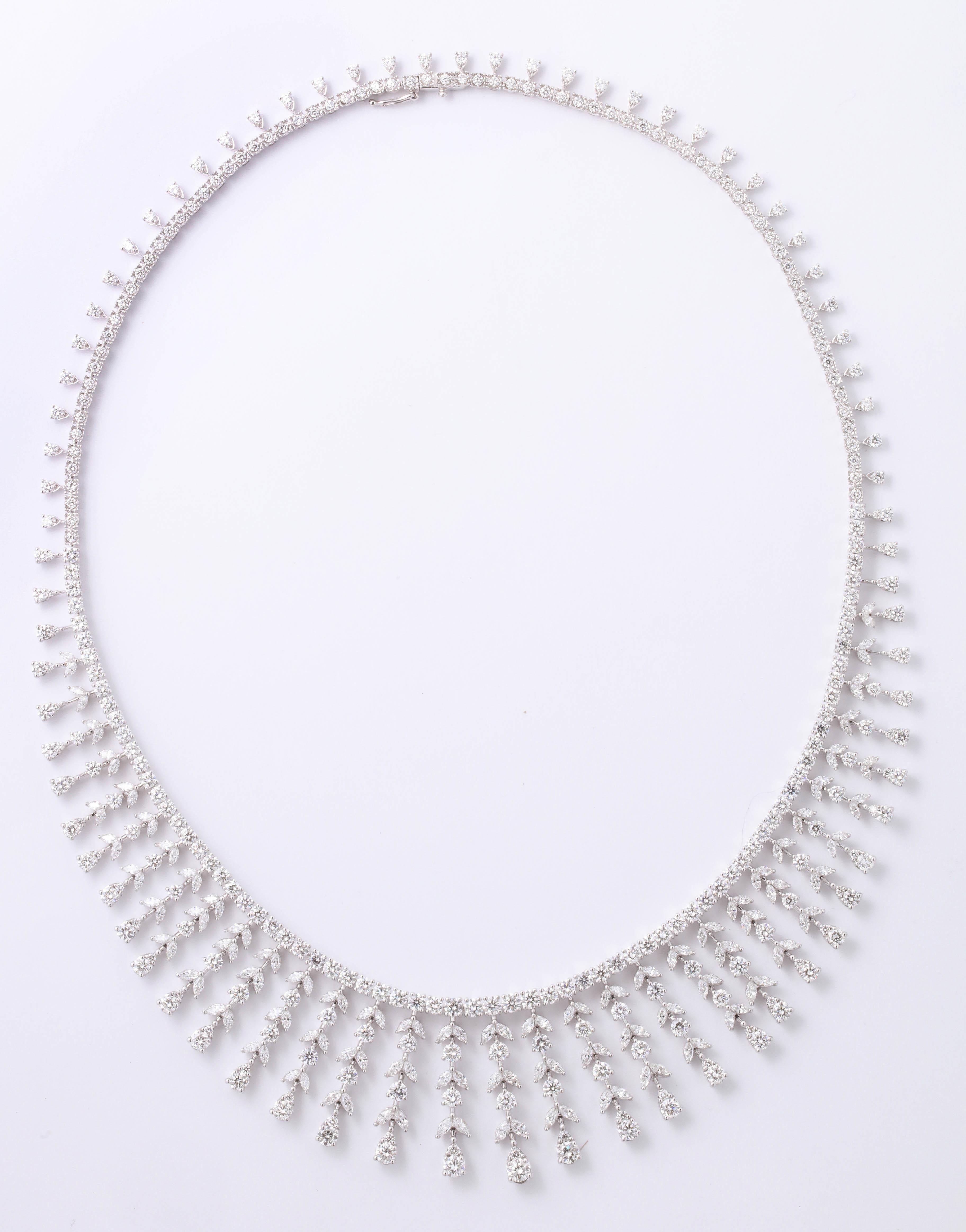 
A GRAND diamond necklace in a timeless design. 

22.06 carats of round brilliant and marquise cut diamonds set in 18k white gold. 

A HUGE look, gently priced. 

The necklace is 16 inches in length but can easily be shortened or lengthened. 