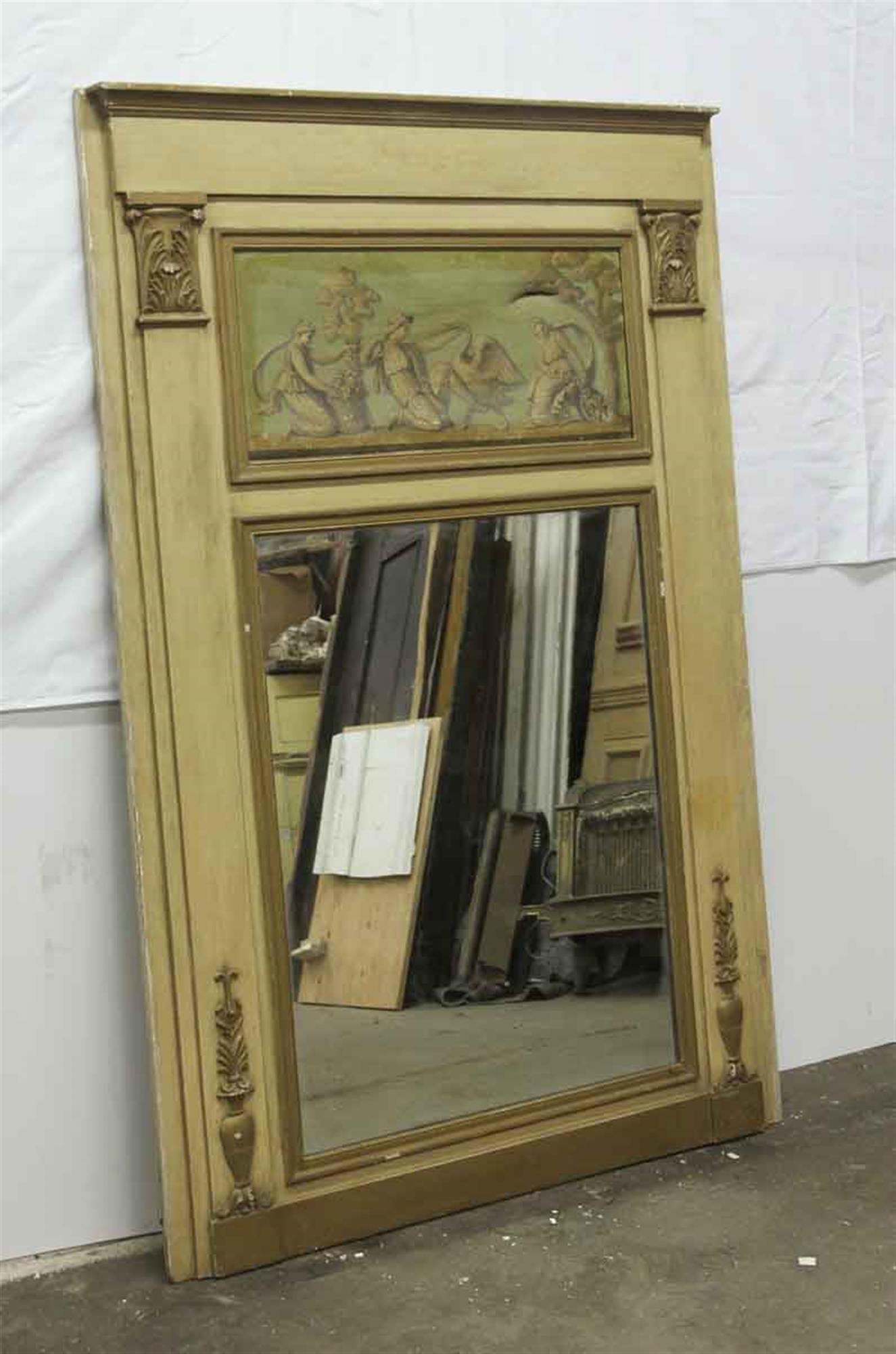 Decorative 1900s tan and brown mirror with a green and tan figural scene on canvas at the top from France. This is original to the 1931 NYC Waldorf Astoria Hotel on Park Ave in Manhattan. Some wear from age and use with slight tear in the fabric at