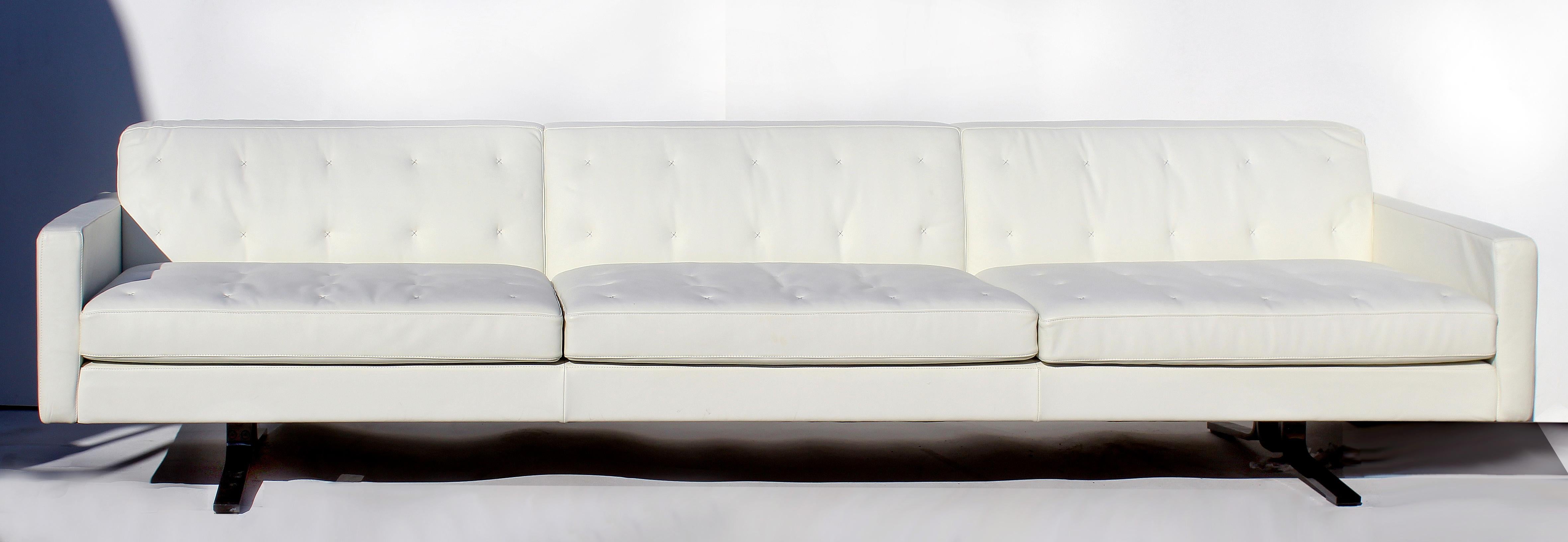 Over-Scale Poltona Frau 'Italy' Leather sofa with Stainless Steel 

Offered for sale is a large and comfortable tufted leather sofa manufactured by Poltrona Frau. This fine quality sofa has very supple white leather upholstery with stitched 