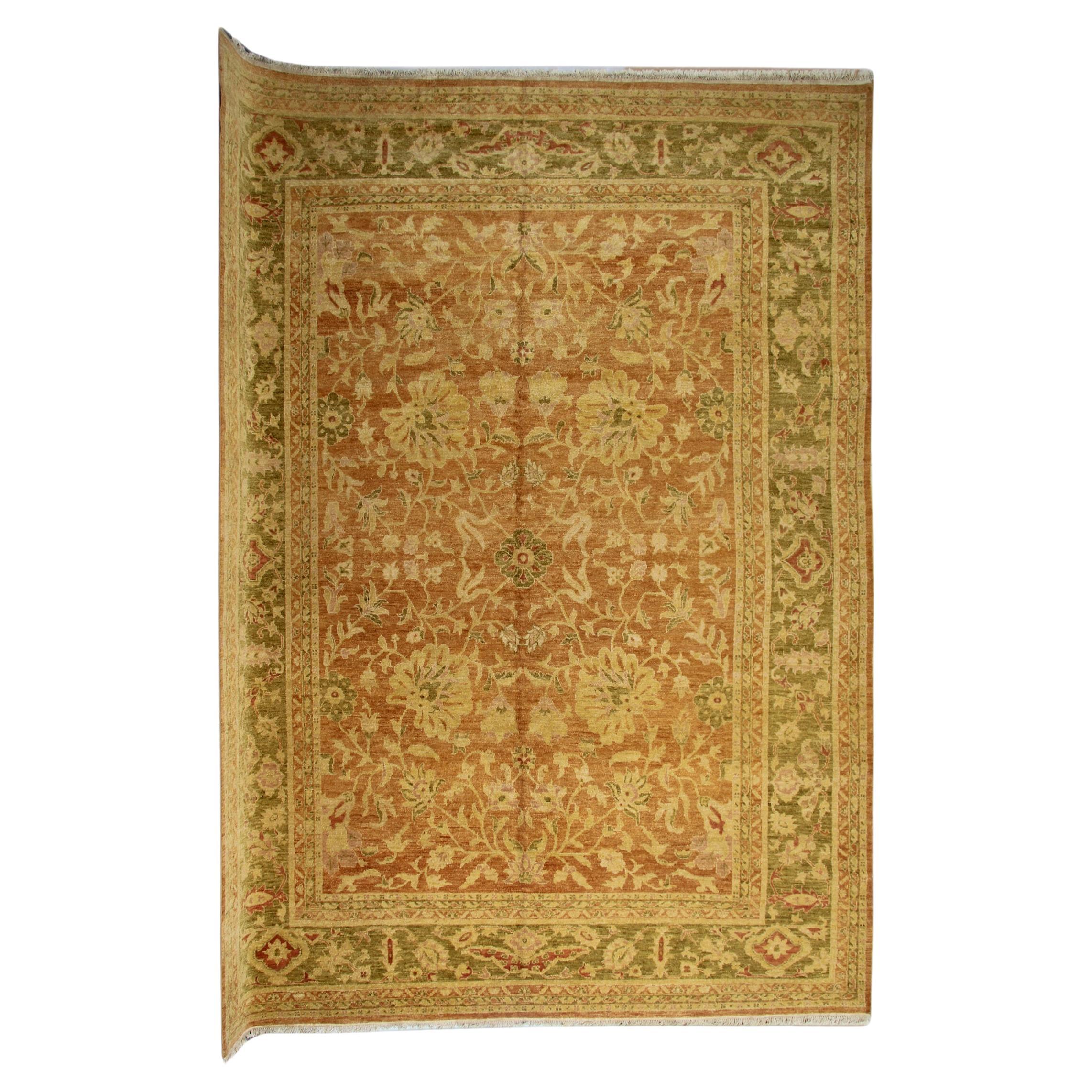 Faithful to the style of many stunning Indian Agra rugs, this masterpiece, which features an antique Persian rug design, combines vibrant colors with elegantly flowing floral motifs to create a sophisticated surface that can add impeccable style and