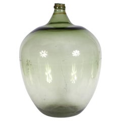 Bouteille Demijohn en verre vert européen antique surdimensionnée