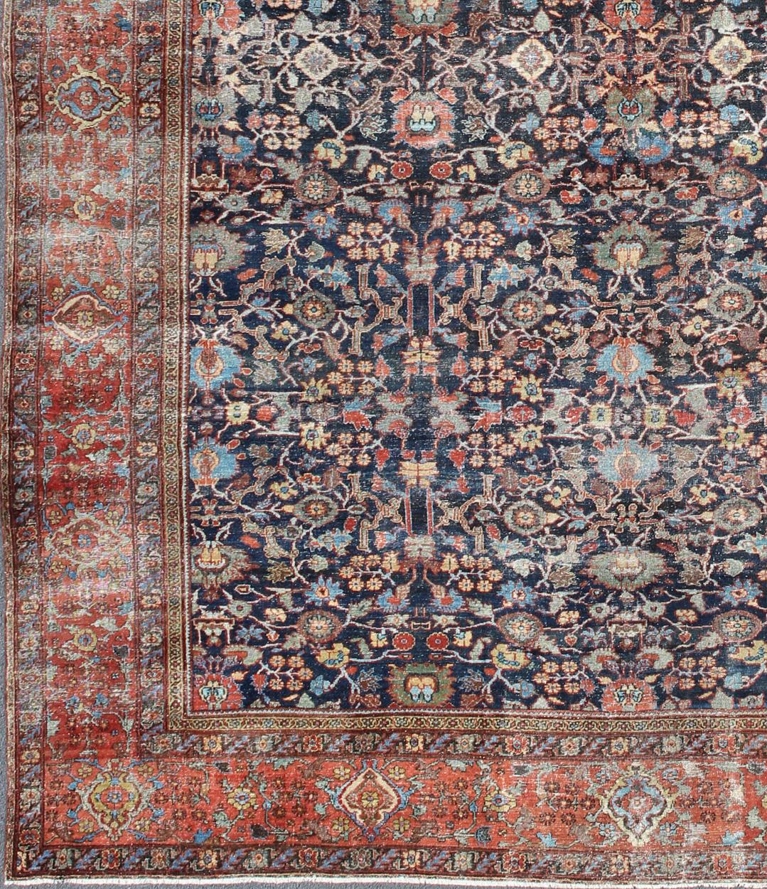 Tapis Persan antique Sultanabad, kwarugs / EMA-7516, pays d'origine / type : Iran / Farahan, vers 1890.

Mesures : 14'3 x 18'2.

Ce tapis Sultanabad ancien à fond bleu marine (vers le XIXe siècle), au tissage très fin, représente ce qui se fait de