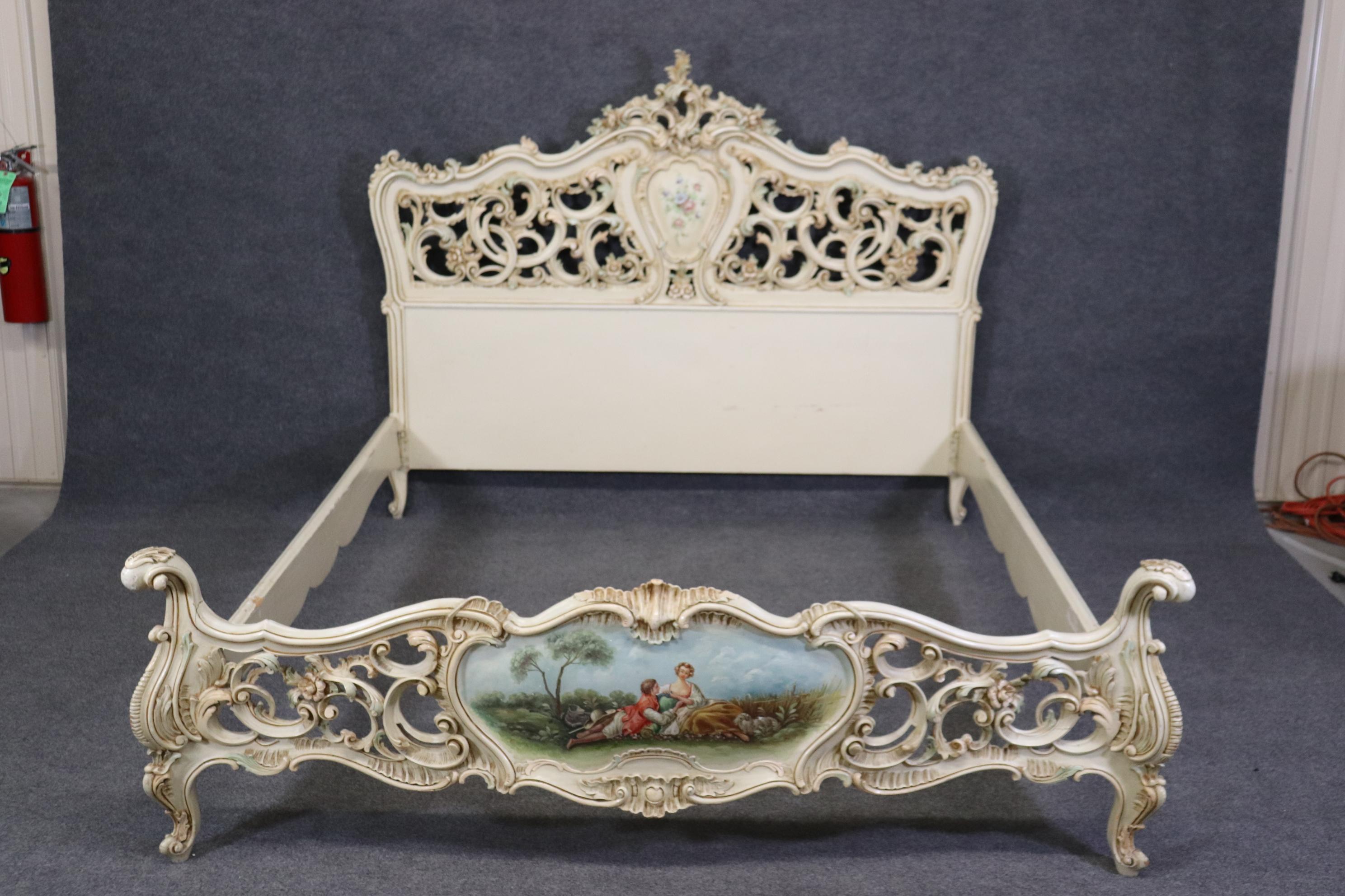 This is a gorgeous Vernis Martin paint decorated bed with a courtship scene. This bed is beautifully carved and has absolutely gorgeous paint decorated scenery. The bed dates to the 1950s era and is ITALIAN which means its not a standard American