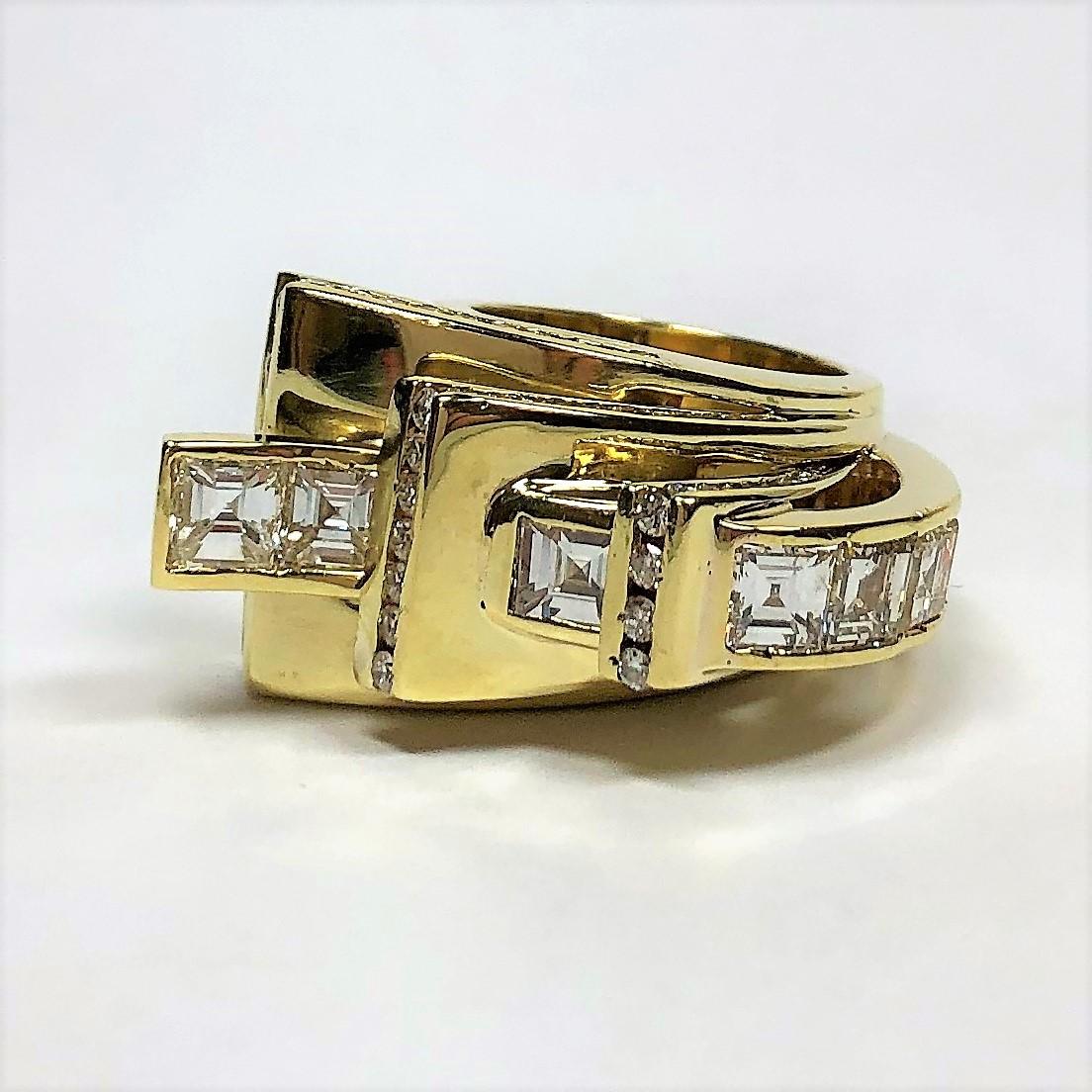Made of 18K Yellow Gold and set with assorted mirror cut and round brilliant cut diamonds weighing a total approximate weight of 6.10CT, of overall G/H Color and VS2 Clarity, this over the top ring was most probably made in the 1960s to look like a