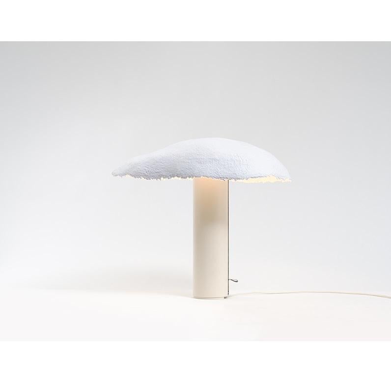 Overcast Light Table Lamp by Calen Knauf
Dimensions: D 43 x W 55 x H 50 cm
Materials: Paper Pulp, Painted Aluminum, Leather, LED

The Overcast light consists of an aluminum cylindrical base and a paper shade. The shade is made from blended paper