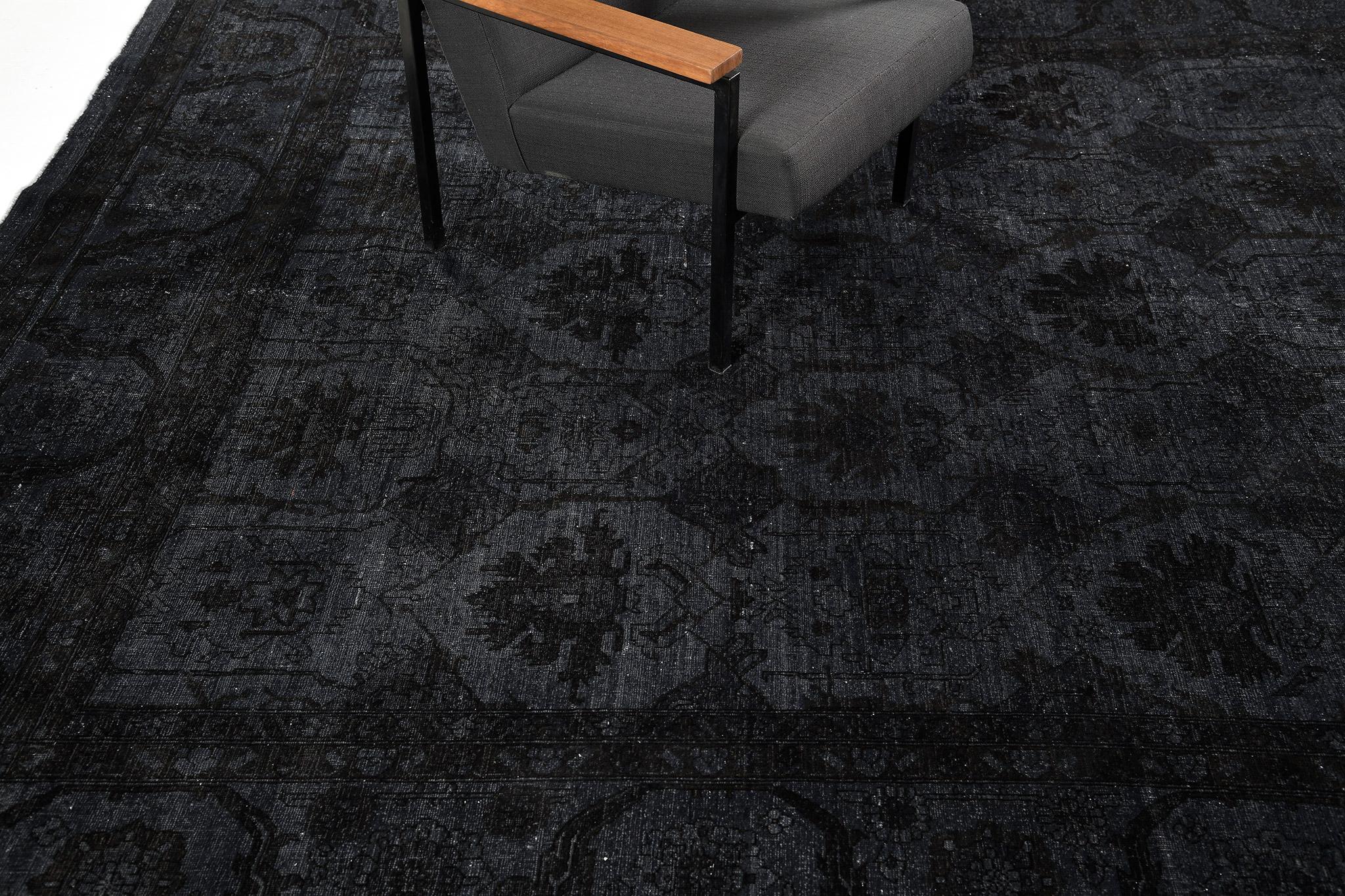 Highlighting a truly magnificent all-over compartmentalized design, this Bakshaish revival rug is a stunning statement piece. Overdyed, this rug features a panel field with alternating stylized palmettes into its majestic brilliant formations. 

Rug