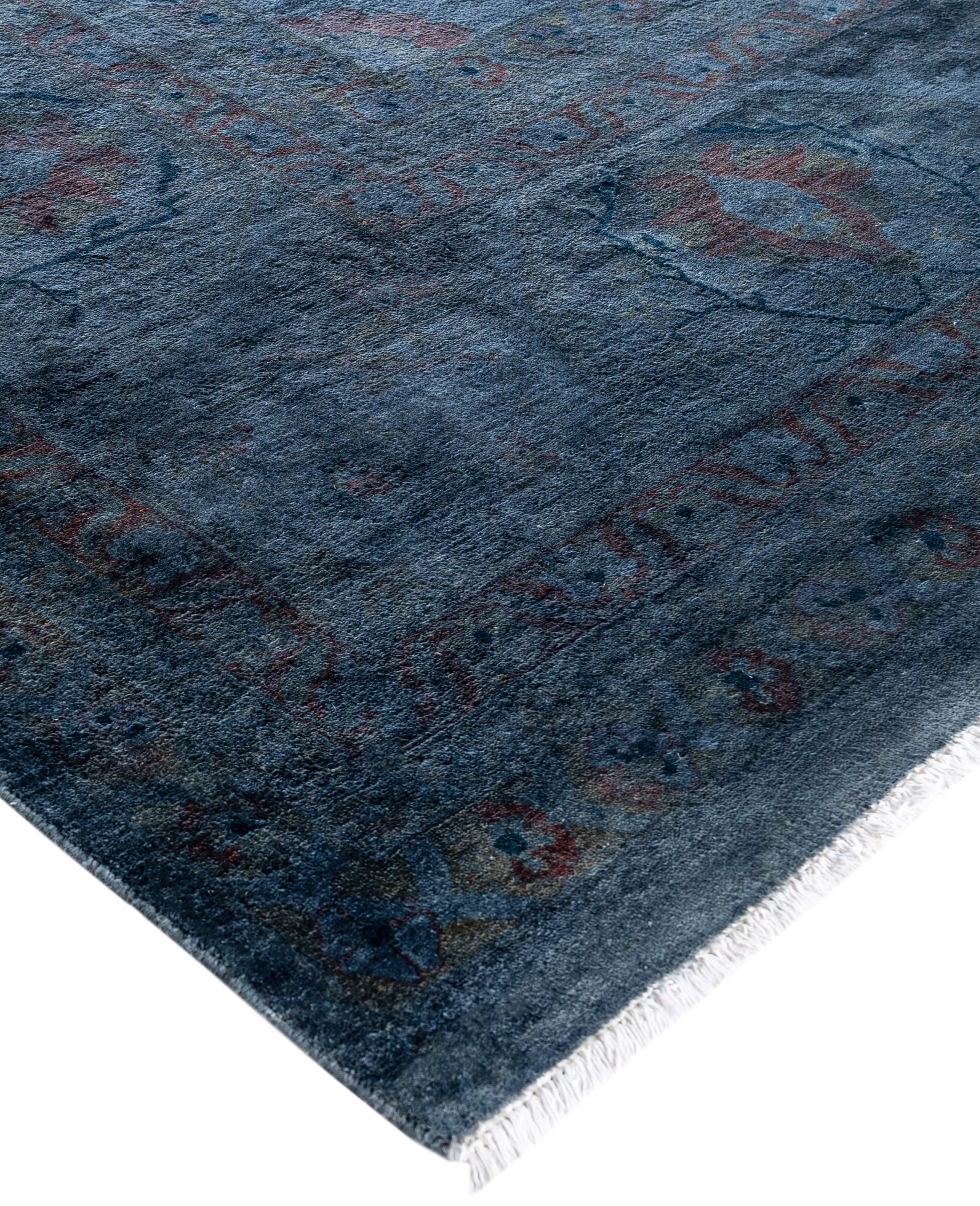 Over-dyed area rugs are created by taking vintage or traditional rugs and applying a vibrant, monochromatic dye over the existing patterns. This technique results in a bold, modern aesthetic while preserving the intricate designs beneath, blending