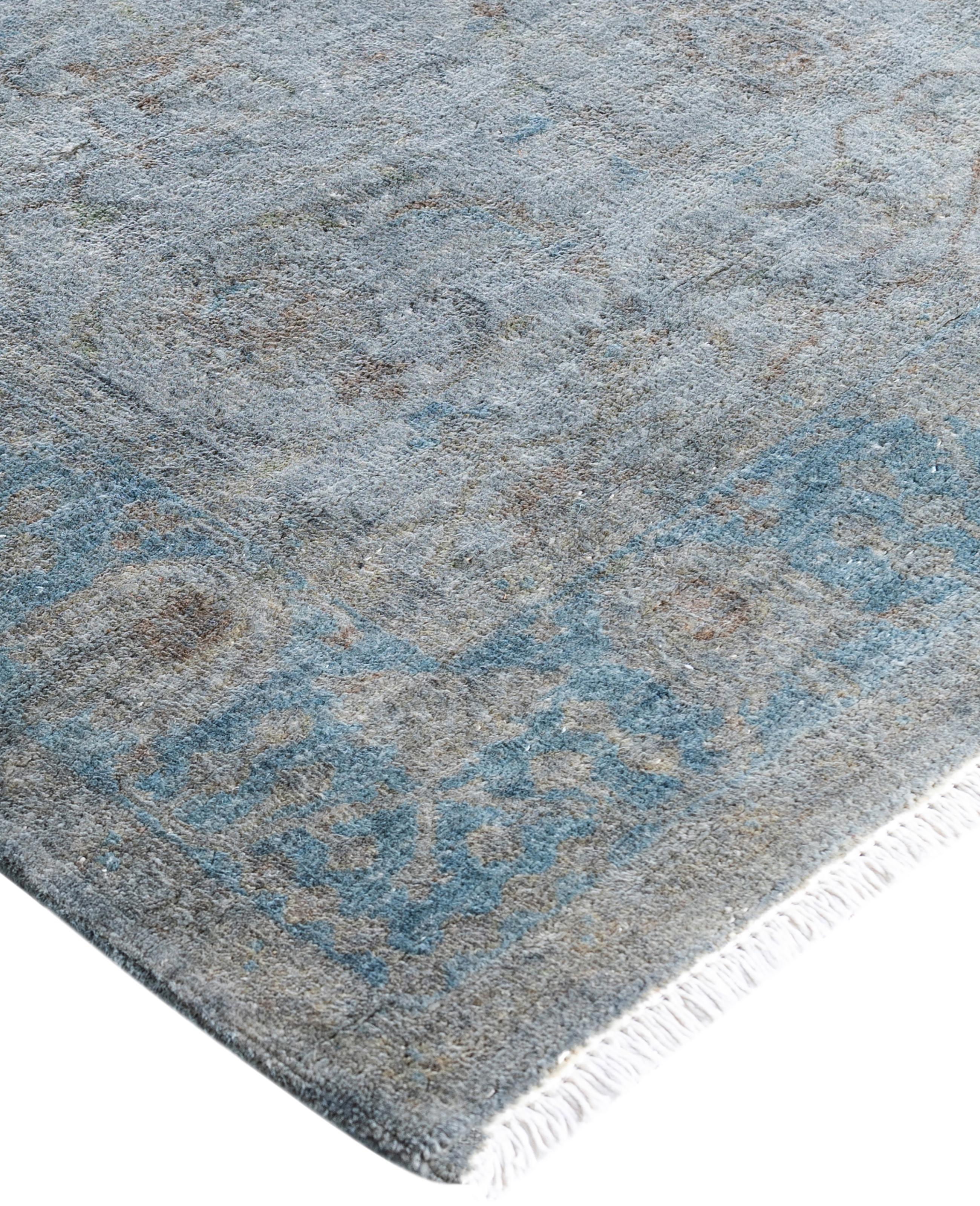 Over-dyed area rugs are created by taking vintage or traditional rugs and applying a vibrant, monochromatic dye over the existing patterns. This technique results in a bold, modern aesthetic while preserving the intricate designs beneath, blending