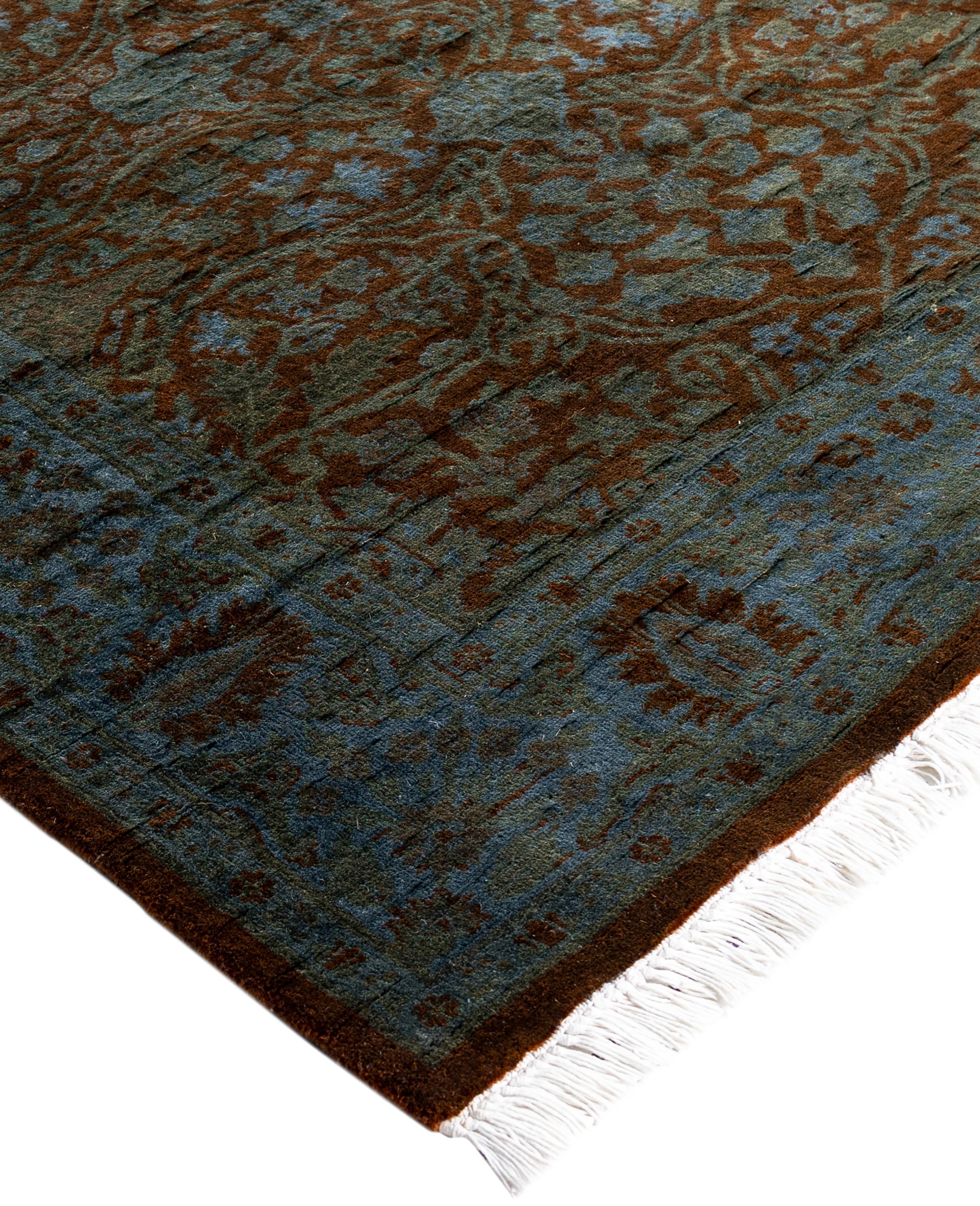 Over-dyed area rugs are created by taking vintage or traditional rugs and applying a vibrant, monochromatic dye over the existing patterns. This technique results in a bold, modern aesthetic while preserving the intricate designs beneath, blending
