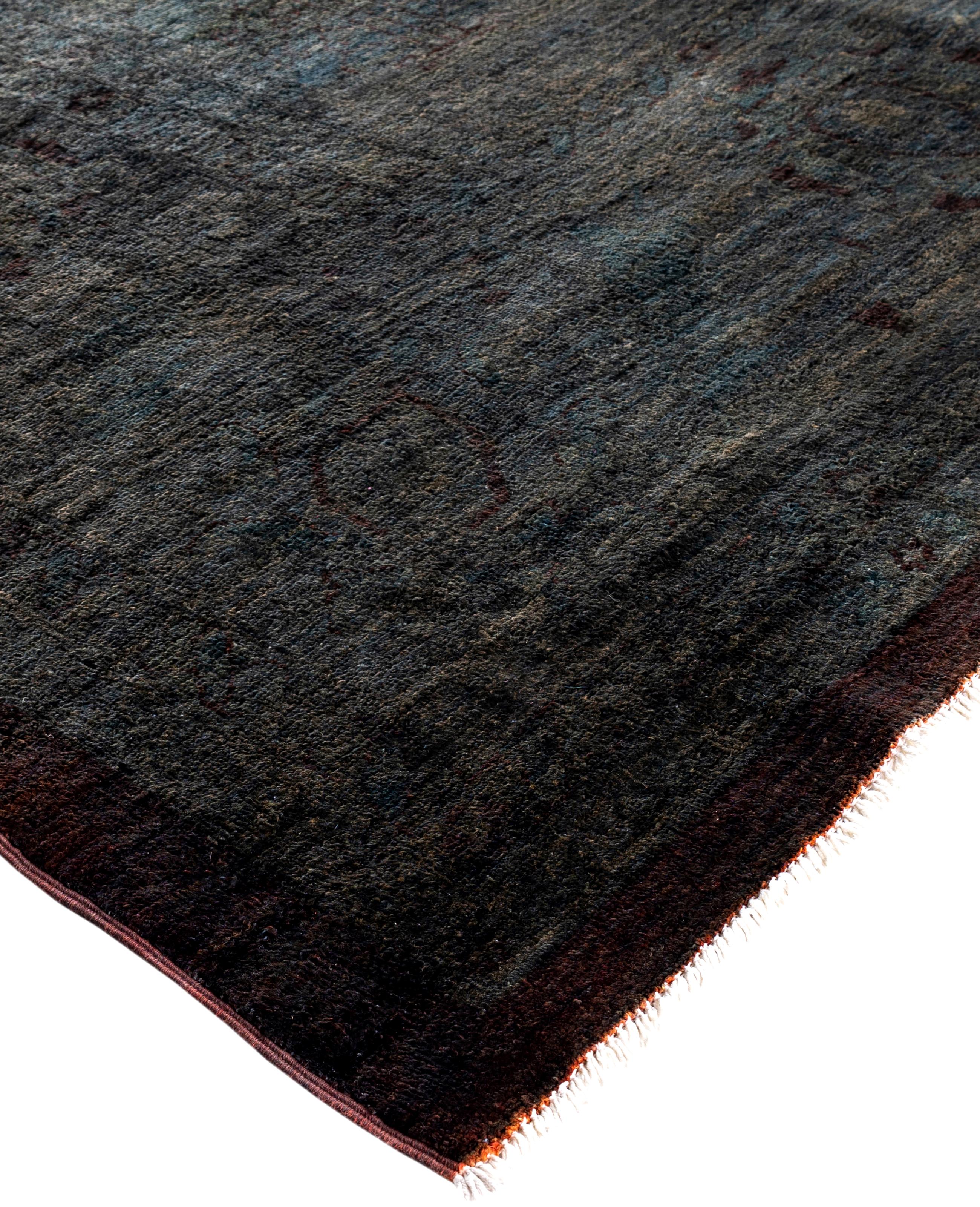 Over-dyed area rugs are created by taking vintage or traditional rugs and applying a vibrant, monochromatic dye over the existing patterns. This technique results in a bold, modern aesthetic while preserving the intricate designs beneath, blending