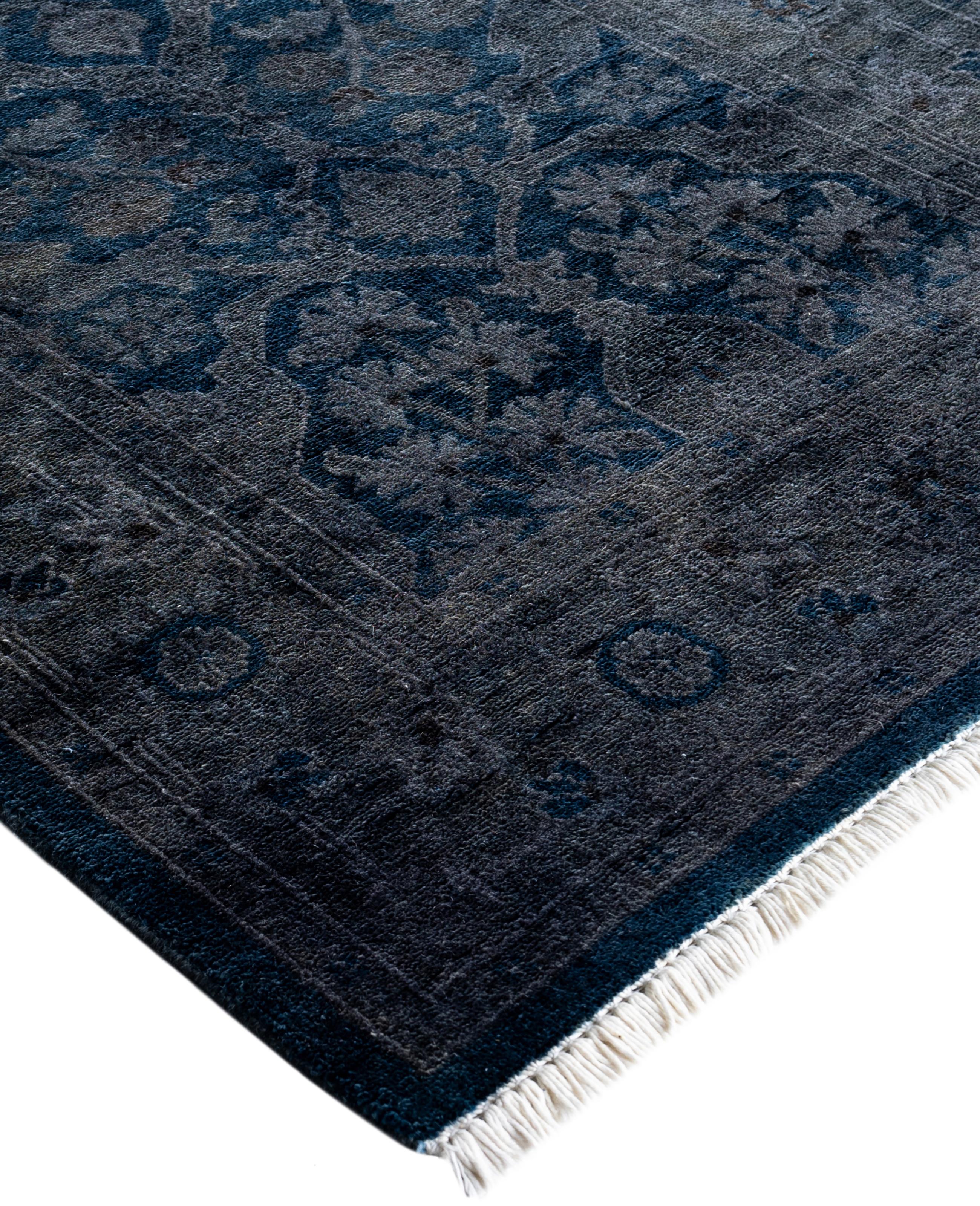 Over-dyed area rugs are created by taking vintage or traditional rugs and applying a vibrant, monochromatic dye over the existing patterns. This technique results in a bold, modern aesthetic while preserving the intricate designs beneath, blending