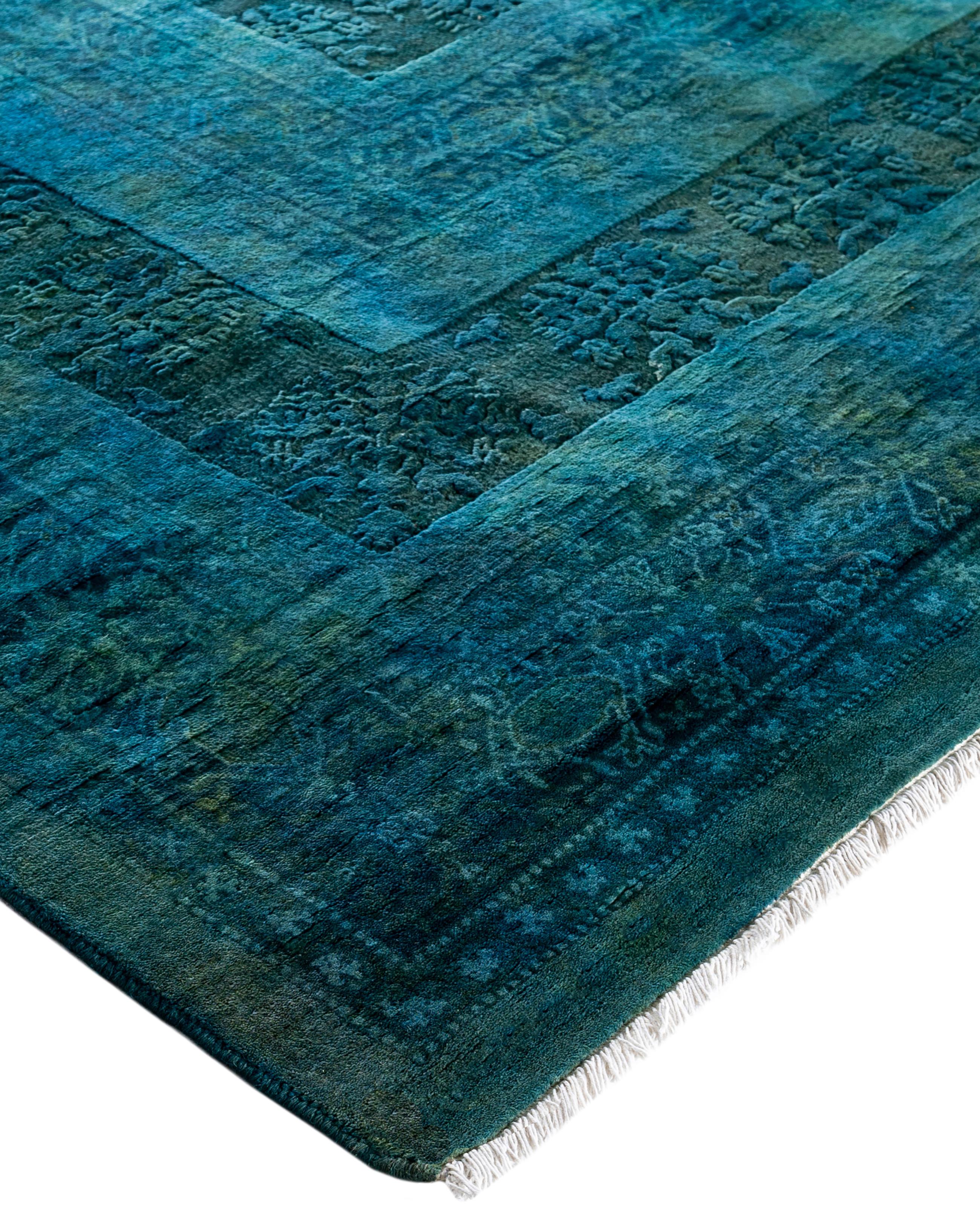 Over-dyed area rugs are created by taking vintage or traditional rugs and applying a vibrant, monochromatic dye over the existing patterns. This technique results in a bold, modern aesthetic while preserving the intricate designs beneath, blending