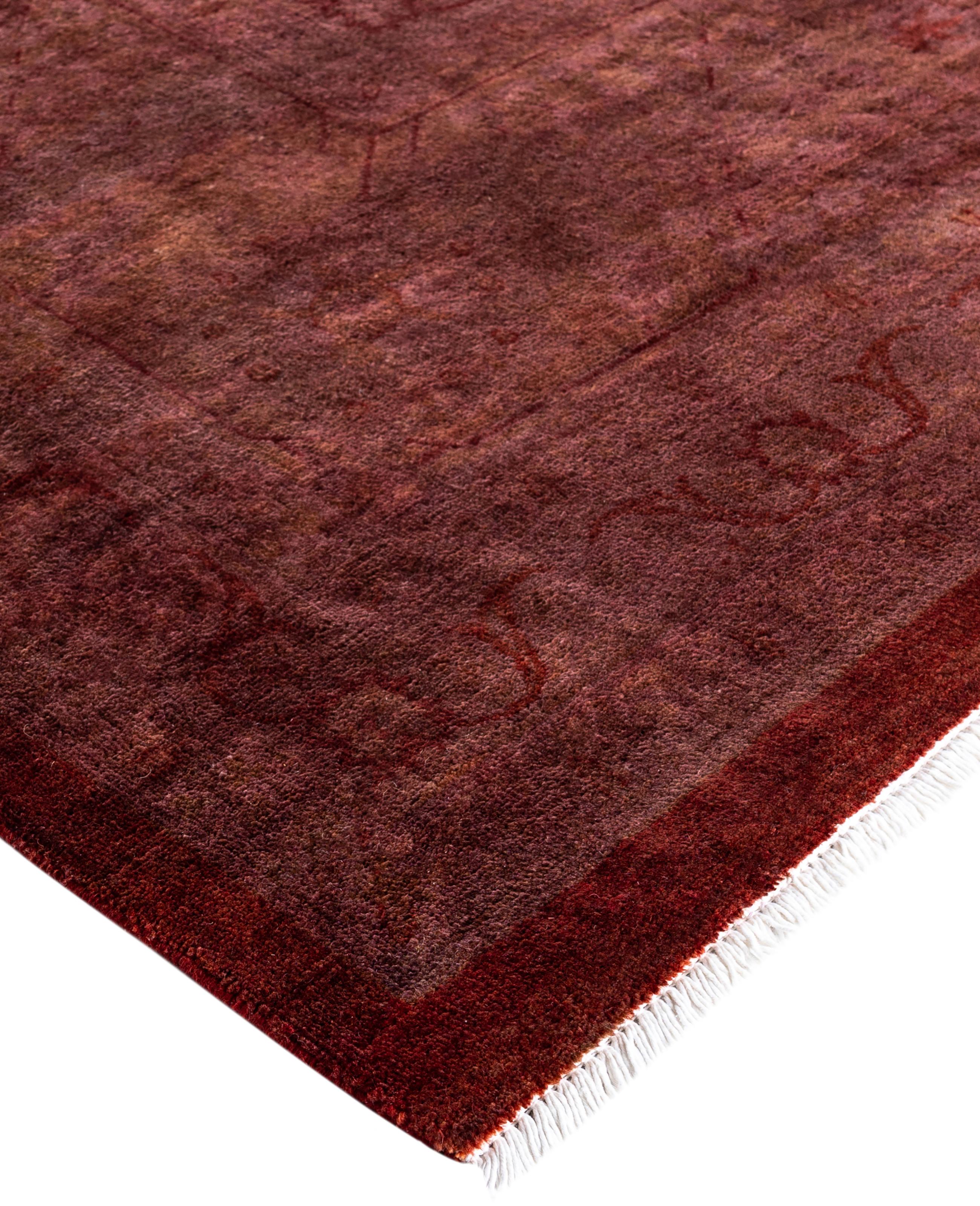 Over-dyed area rugs are created by taking vintage or traditional rugs and applying a vibrant, monochromatic dye over the existing patterns. This technique results in a bold, modern aesthetic while preserving the intricate designs beneath, blending