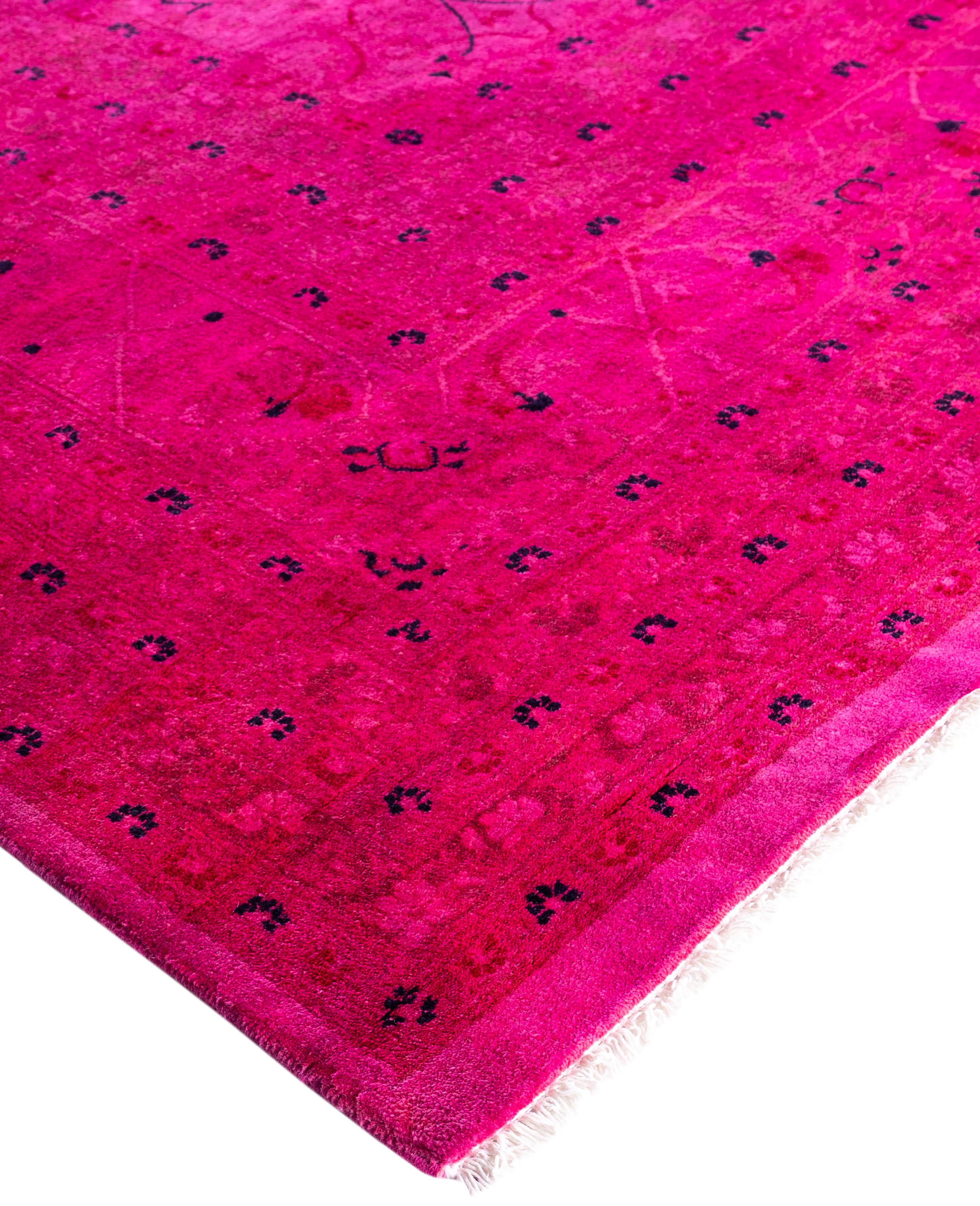 Over-dyed area rugs are created by taking vintage or traditional rugs and applying a vibrant, monochromatic dye over the existing patterns. This technique results in a bold, modern aesthetic while preserving the intricate designs beneath, blending