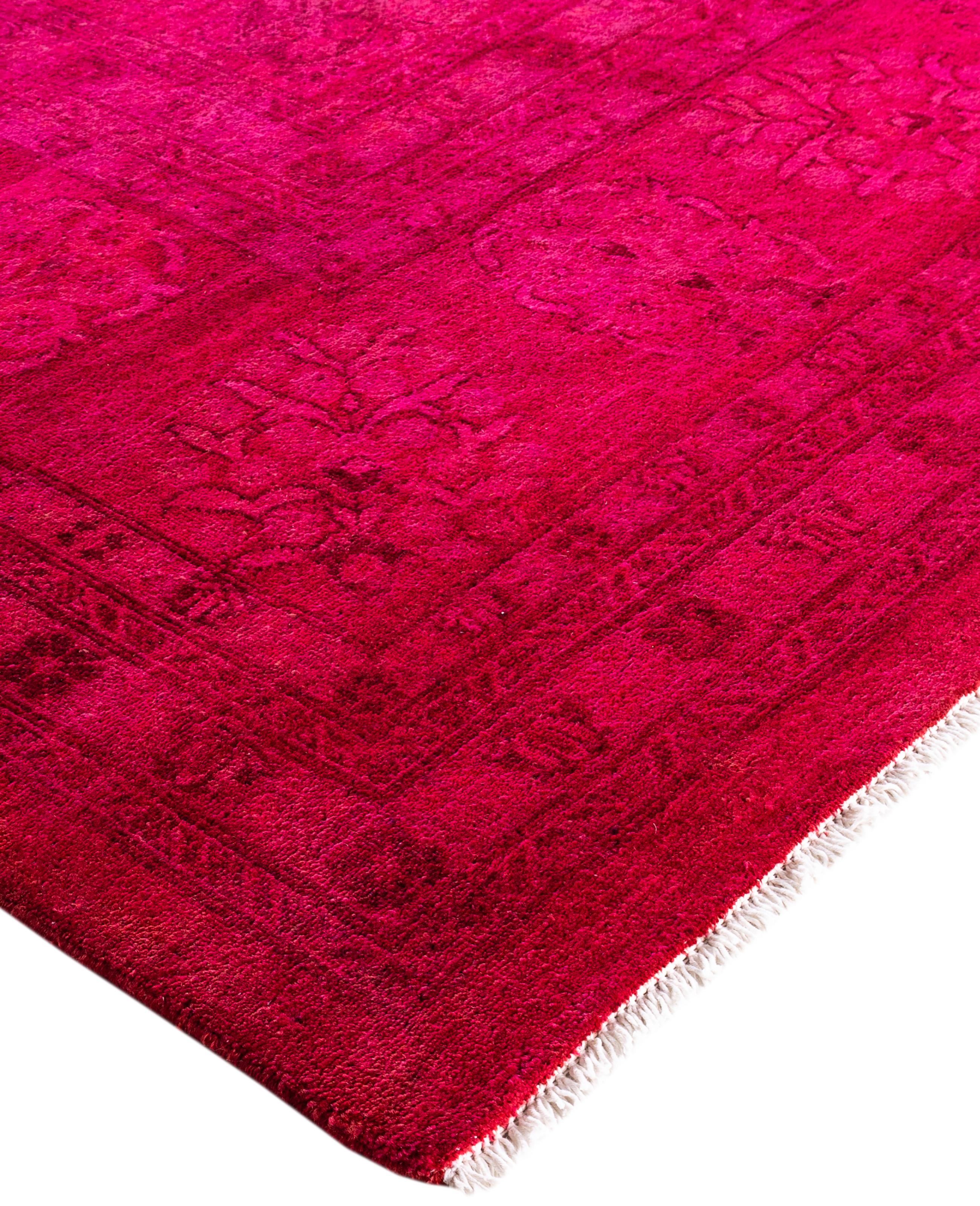 Over-dyed area rugs are created by taking vintage or traditional rugs and applying a vibrant, monochromatic dye over the existing patterns. This technique results in a bold, modern aesthetic while preserving the intricate designs beneath, blending