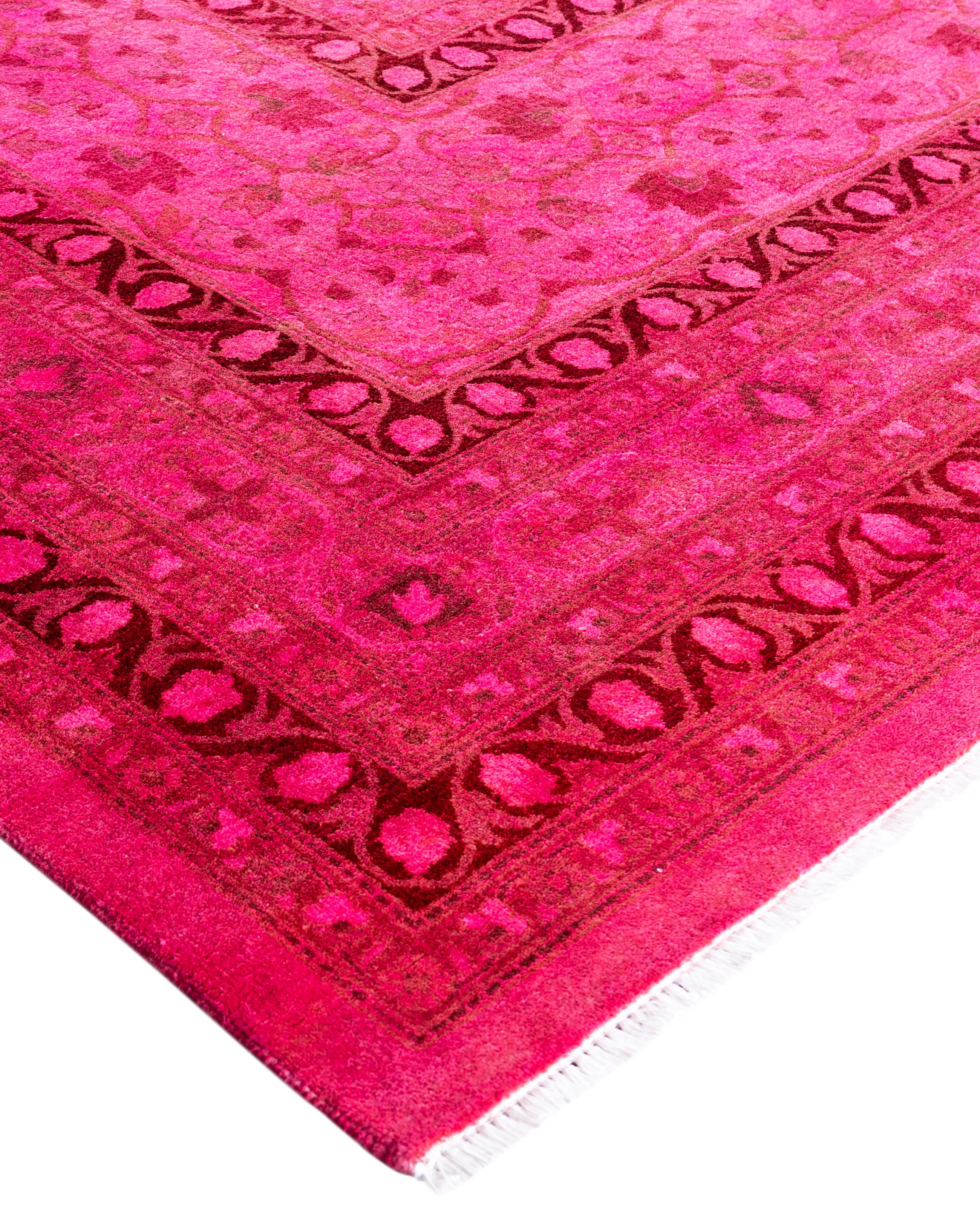 Over-dyed area rugs are created by taking vintage or traditional rugs and applying a vibrant, monochromatic dye over the existing patterns. This technique results in a bold, modern aesthetic while preserving the intricate designs beneath, blending
