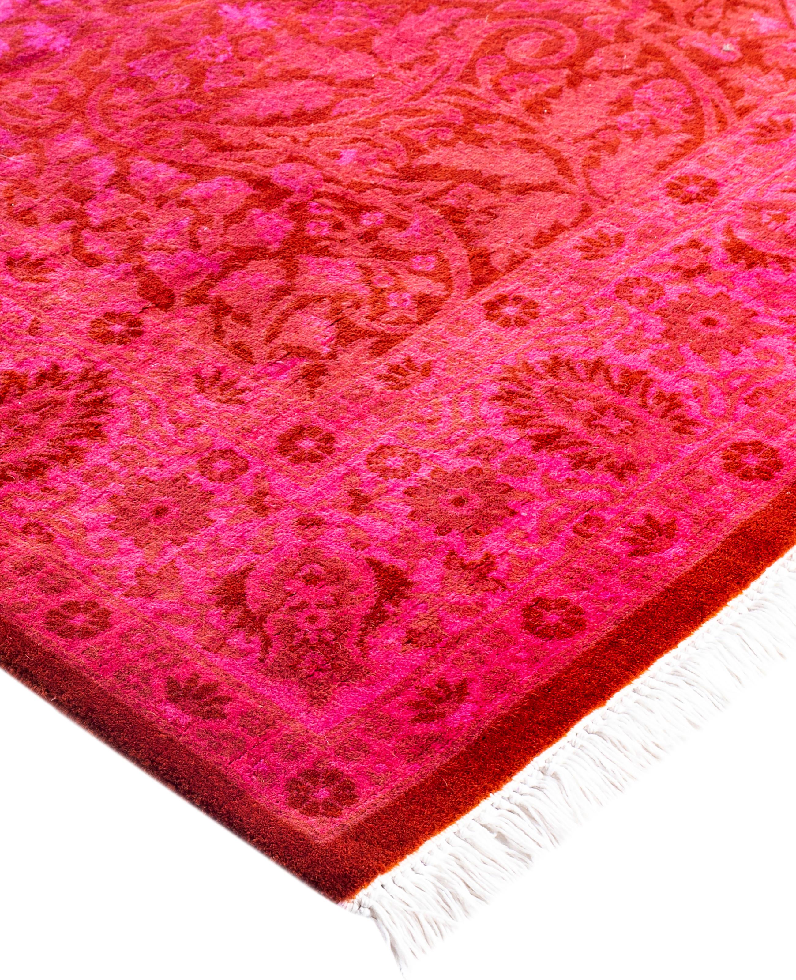 Over-dyed area rugs are created by taking vintage or traditional rugs and applying a vibrant, monochromatic dye over the existing patterns. This technique results in a bold, modern aesthetic while preserving the intricate designs beneath, blending