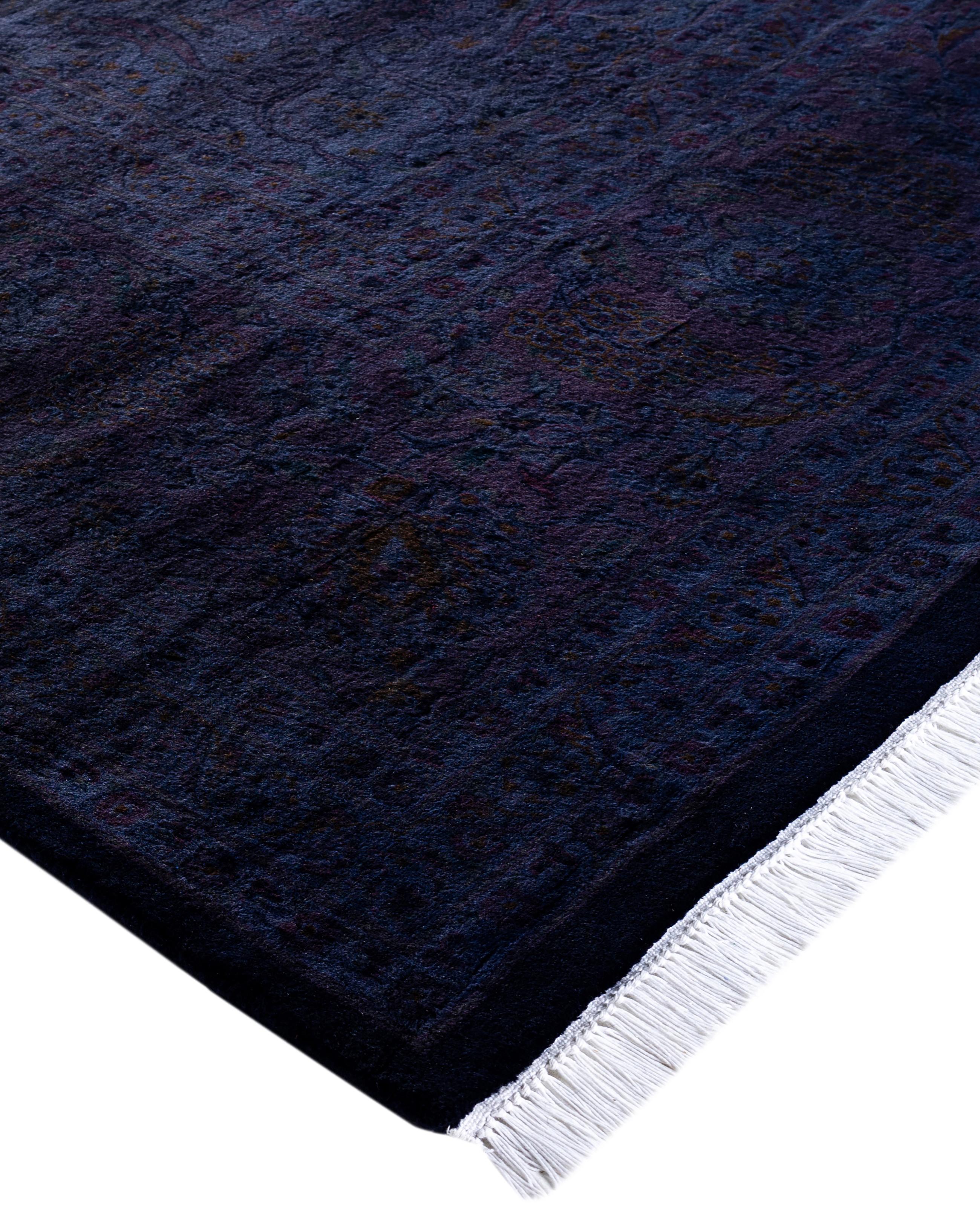 Over-dyed area rugs are created by taking vintage or traditional rugs and applying a vibrant, monochromatic dye over the existing patterns. This technique results in a bold, modern aesthetic while preserving the intricate designs beneath, blending