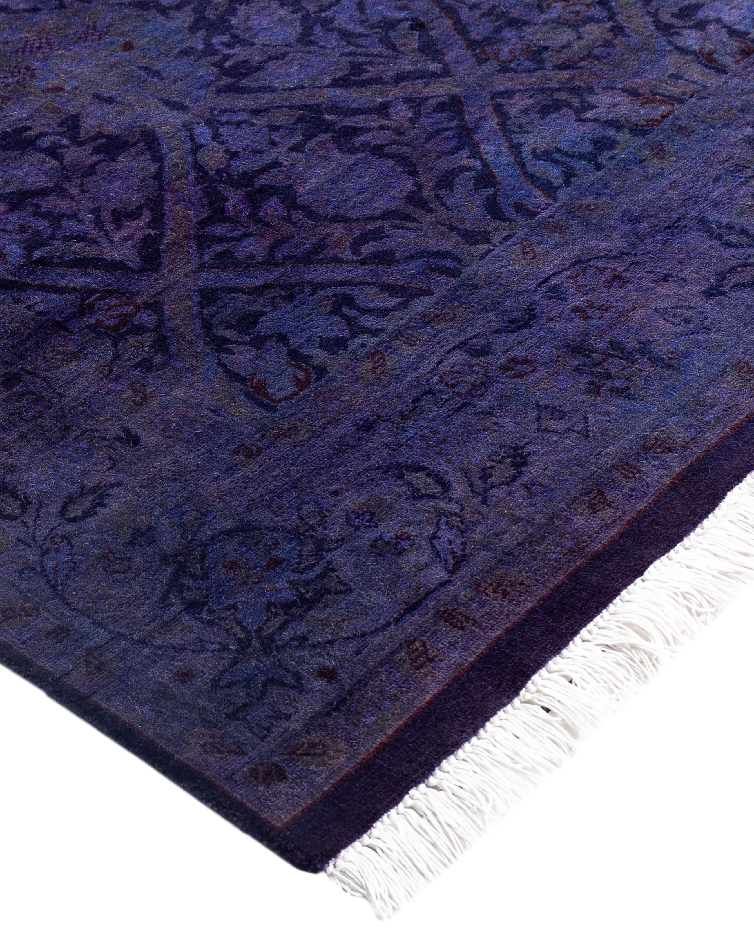 Over-dyed area rugs are created by taking vintage or traditional rugs and applying a vibrant, monochromatic dye over the existing patterns. This technique results in a bold, modern aesthetic while preserving the intricate designs beneath, blending