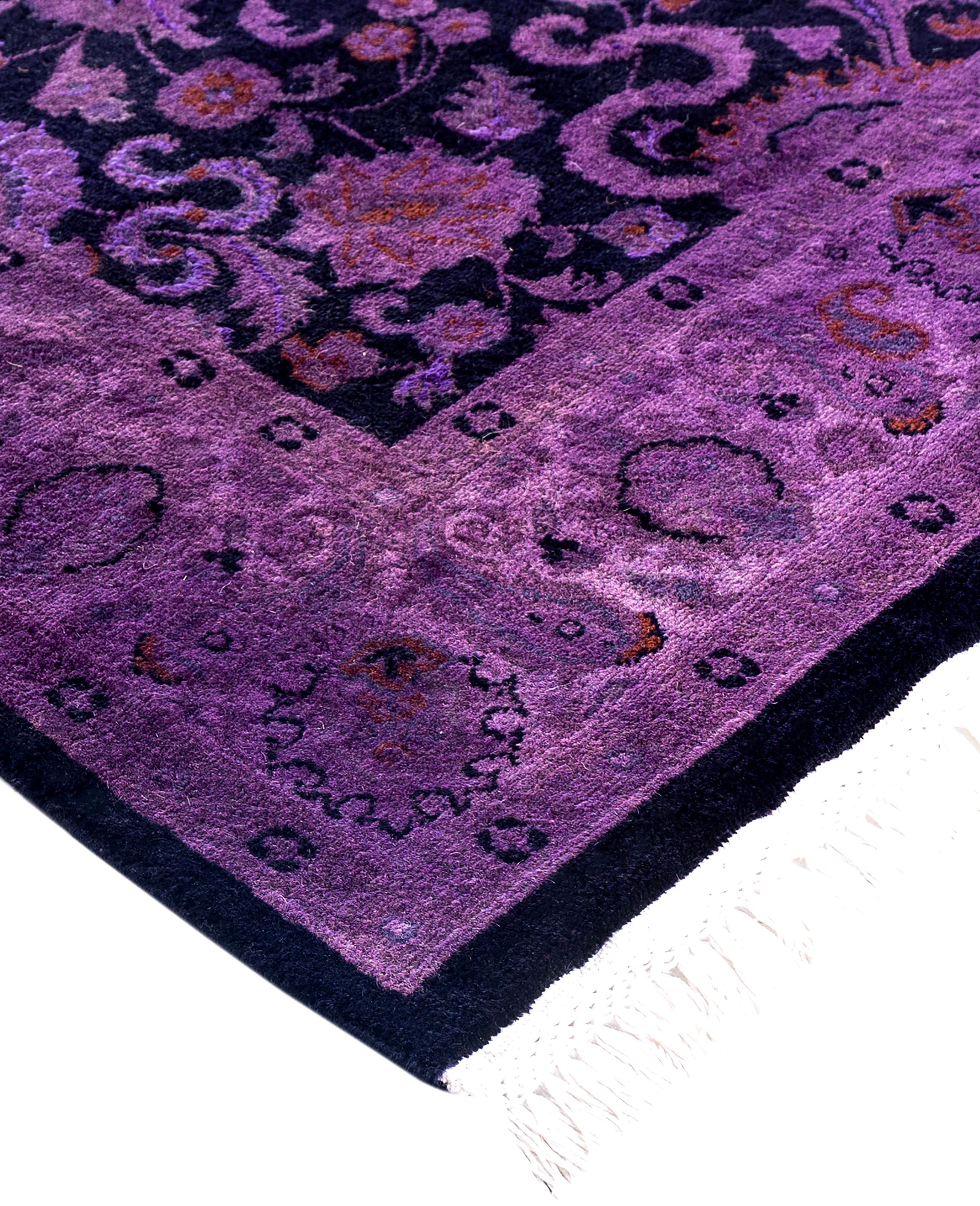 Over-dyed area rugs are created by taking vintage or traditional rugs and applying a vibrant, monochromatic dye over the existing patterns. This technique results in a bold, modern aesthetic while preserving the intricate designs beneath, blending