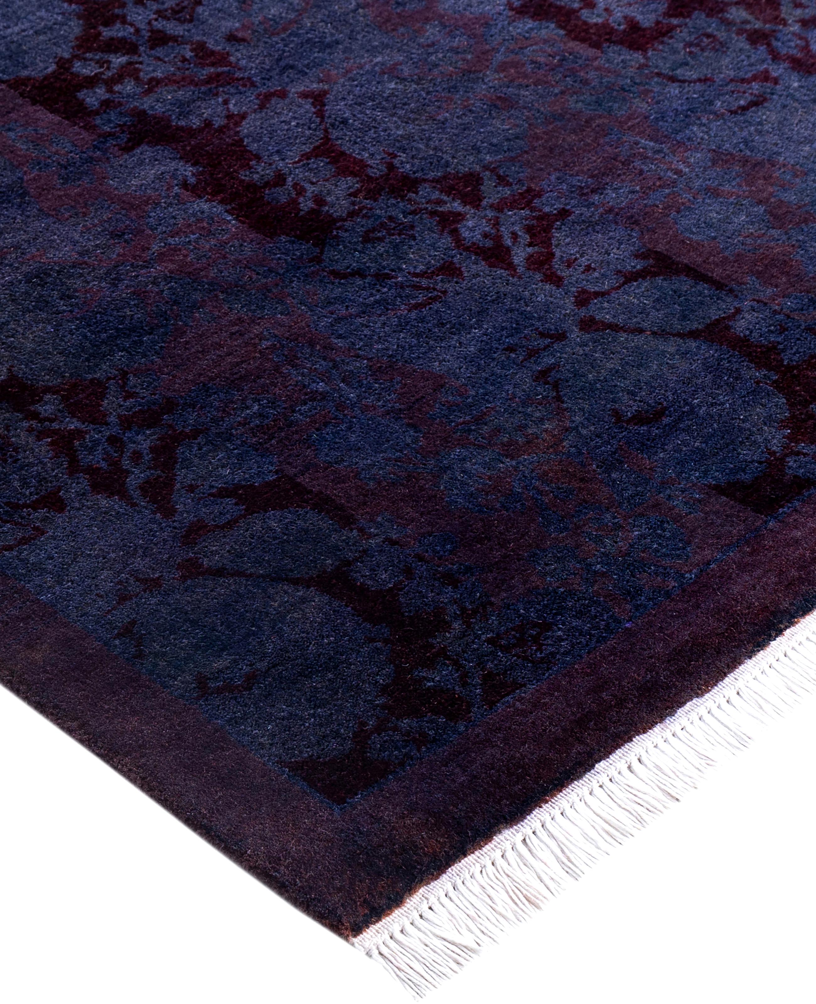 Over-dyed area rugs are created by taking vintage or traditional rugs and applying a vibrant, monochromatic dye over the existing patterns. This technique results in a bold, modern aesthetic while preserving the intricate designs beneath, blending