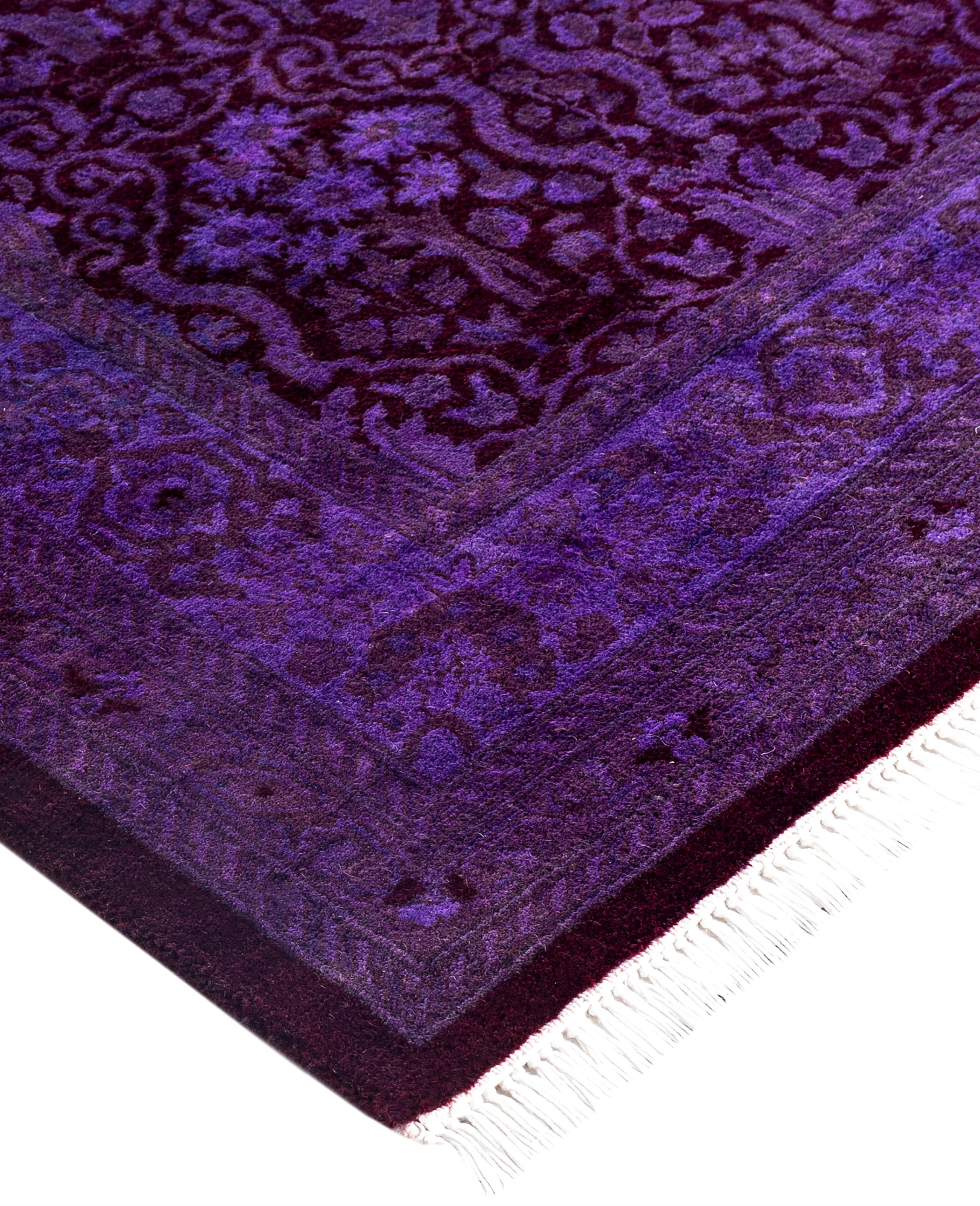 Over-dyed area rugs are created by taking vintage or traditional rugs and applying a vibrant, monochromatic dye over the existing patterns. This technique results in a bold, modern aesthetic while preserving the intricate designs beneath, blending