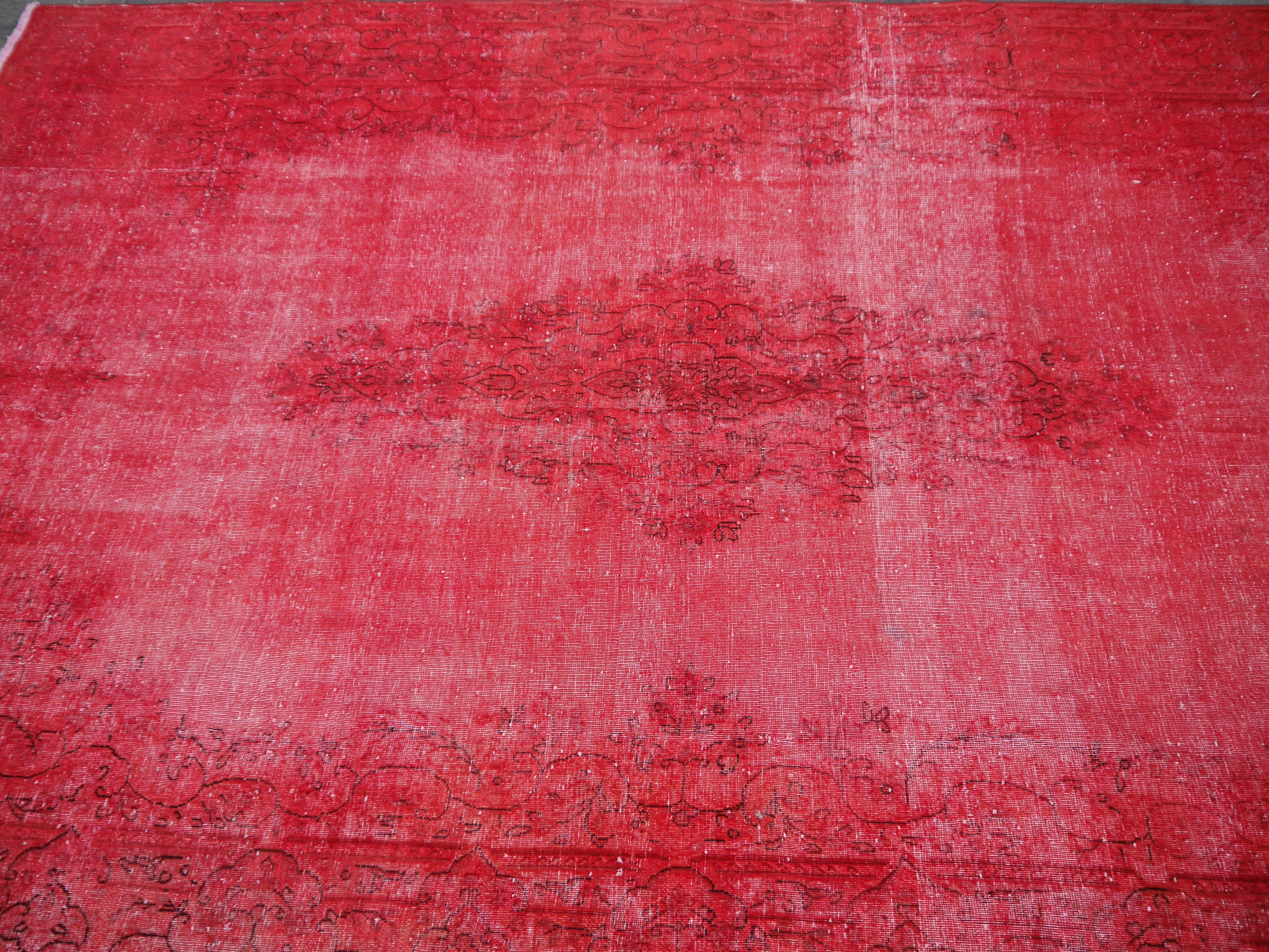 red overdyed rug