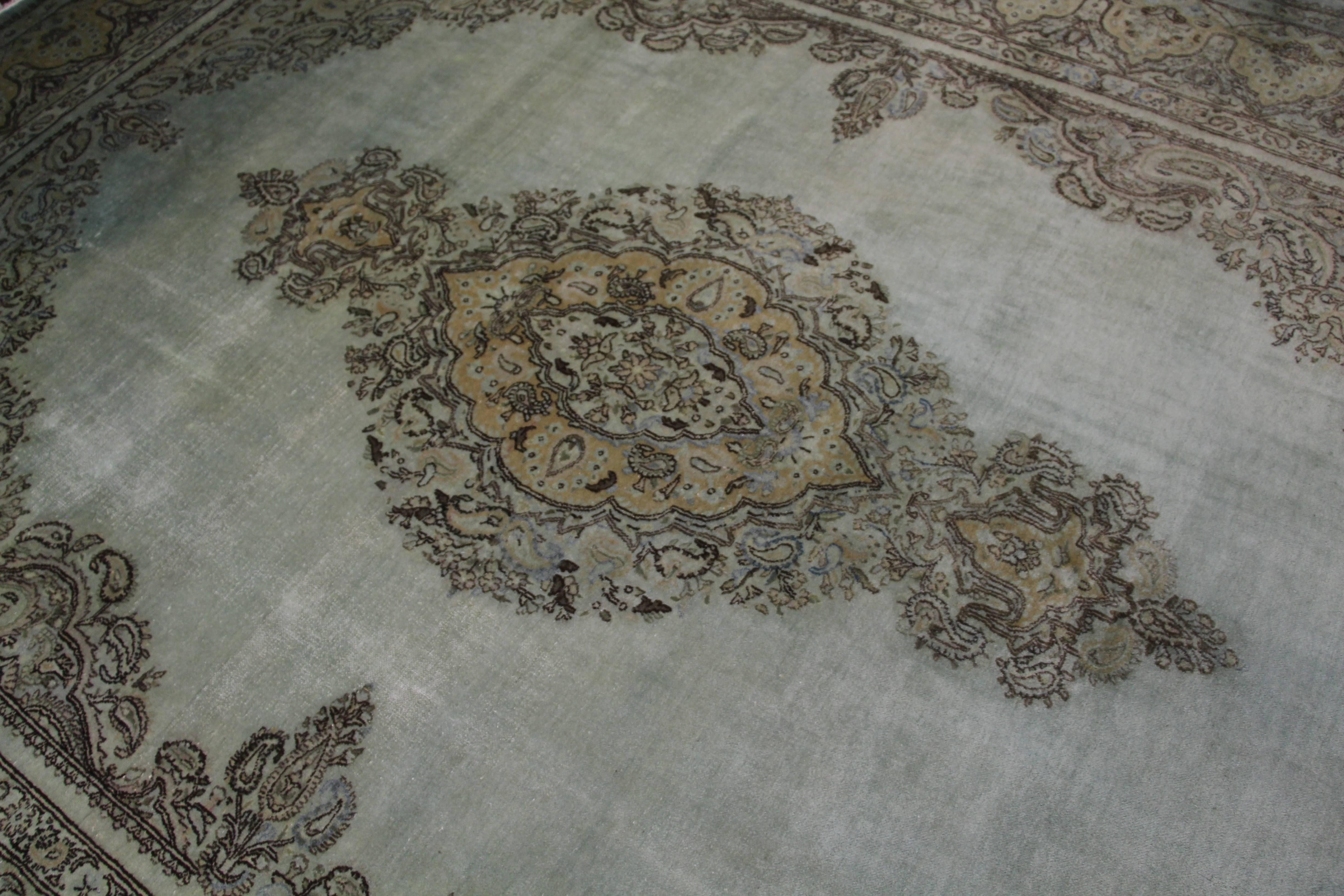 Overdyed Sage antique Kerman carpet

Measure: 9' 9'' x 13' 3''.