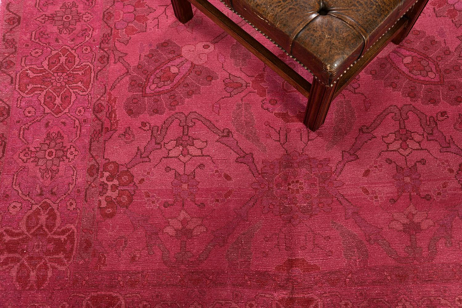 This magenta-overdyed vintage rug is an instant master work of art. With its understated design and style, this woven piece of art exudes elegance from every thread. The wool is soft and supple, but durable to last a lifetime. A decor that would be