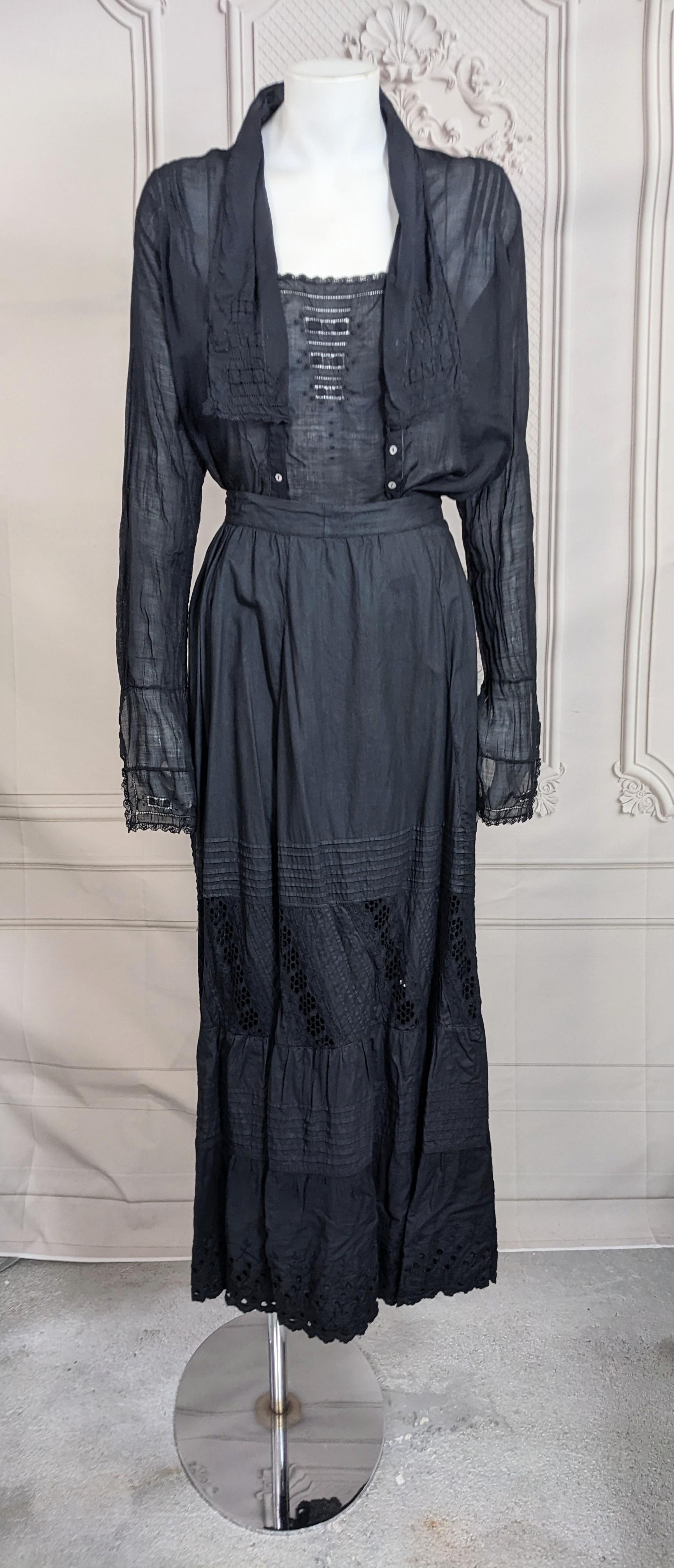 Overdyed Victorian Petticoat from the late 19th Century Studio by Vintage Luxury. Inserted with diagonal eyelet, tucks on cotton percale with double ruffle hem and fullness on back. Tiny waist 21