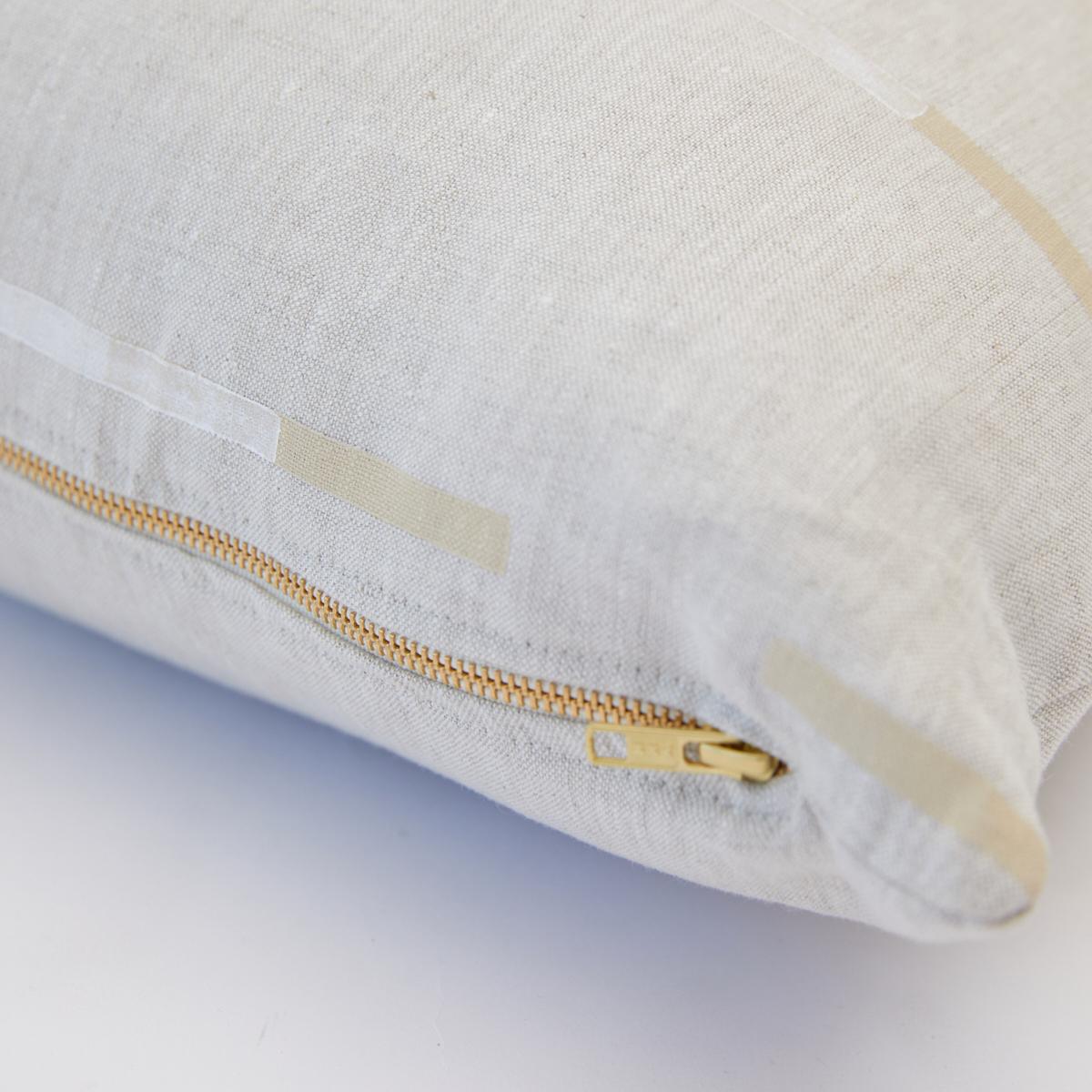 This pillow features Overlapping Dashes by Caroline Z Hurleywith a knife edge finish. Designed by Caroline Z Hurley in her Brooklyn studio and block-printed in New Bedford, Massachusetts. Each shape is cut and individually stamped onto the linen by